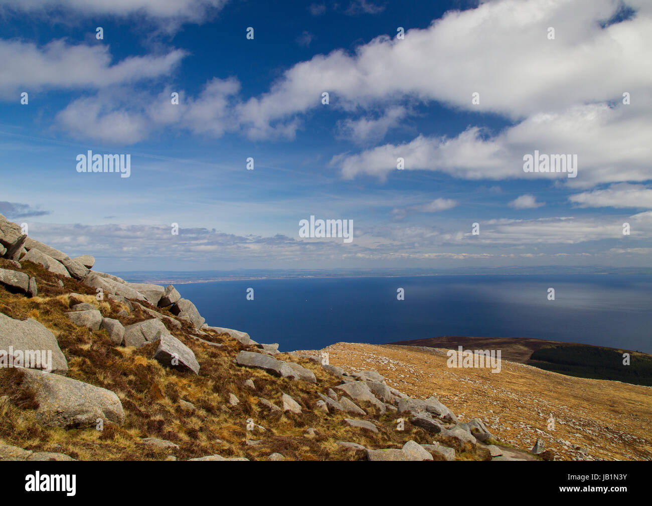 Looking Southeast over the Firth of Clyde to mainland Scotland from the summit of Goat Fell on Arran Stock Photo