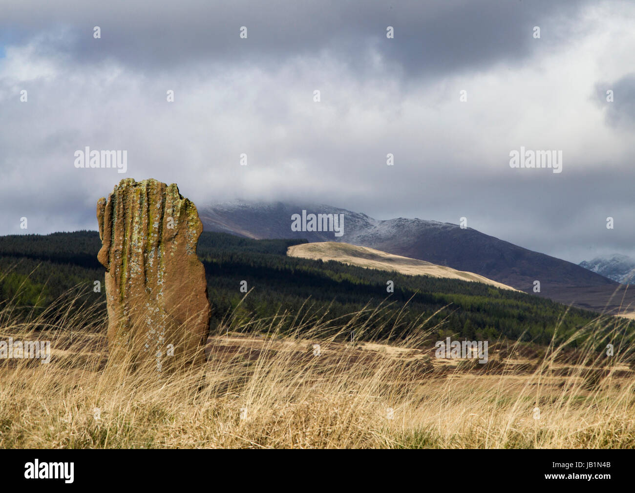 Machriemoor standing stones with mountains of Arran in the background Stock Photo