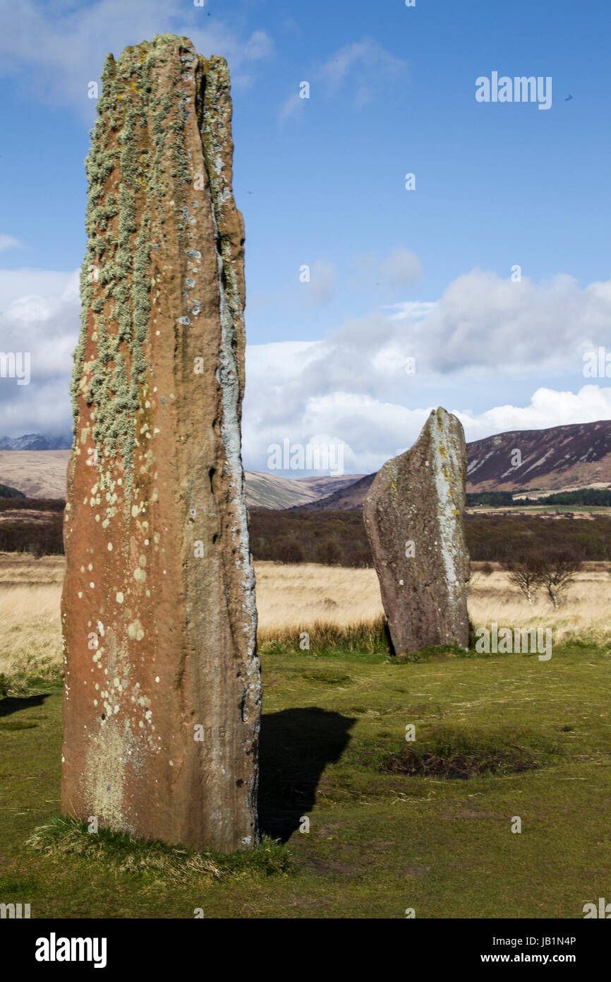 Machriemoor standing stones with mountains of Arran in the background Stock Photo