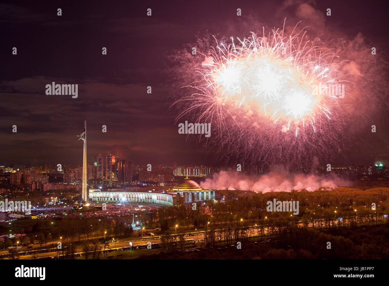 Bright fireworks explosions in night sky in Moscow, Russia Stock Photo