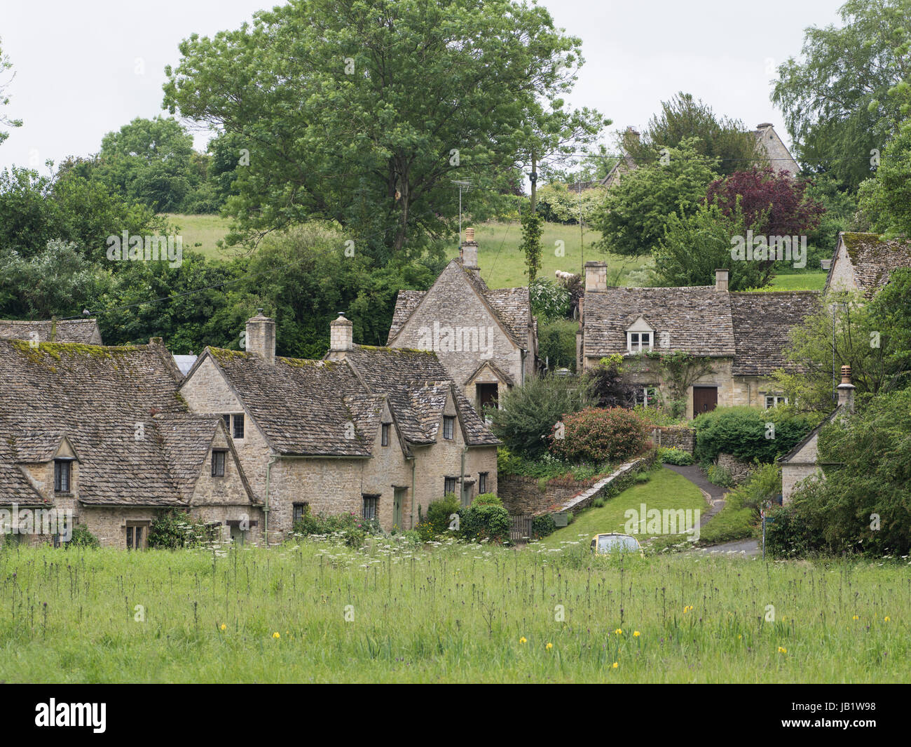 Beautiful Arlington Row cottages in Bibury, Gloucestershire, Cotswolds, United Kingdom Stock Photo