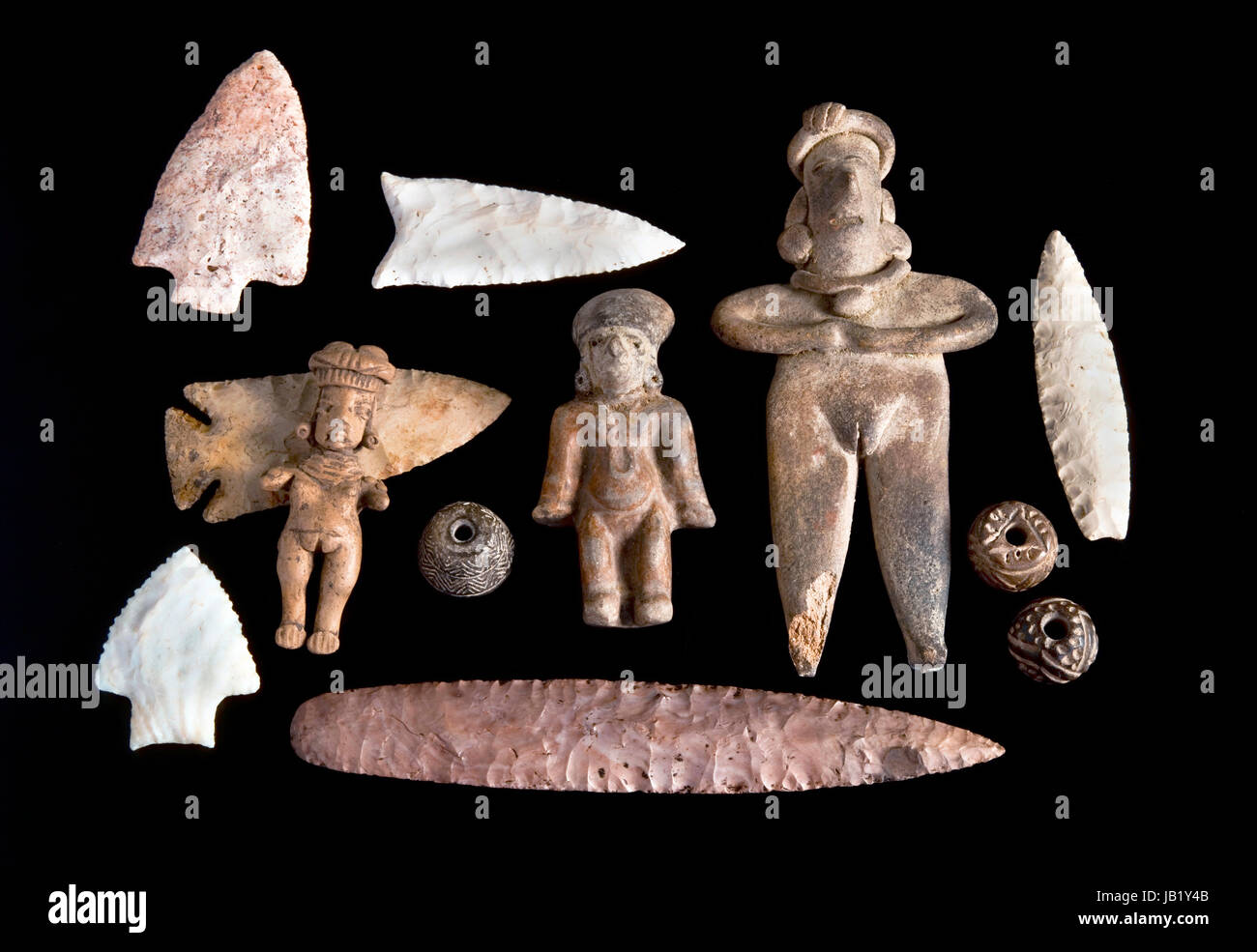 Real Pre Columbian figures,spindle whorls and arrowheads. Stock Photo
