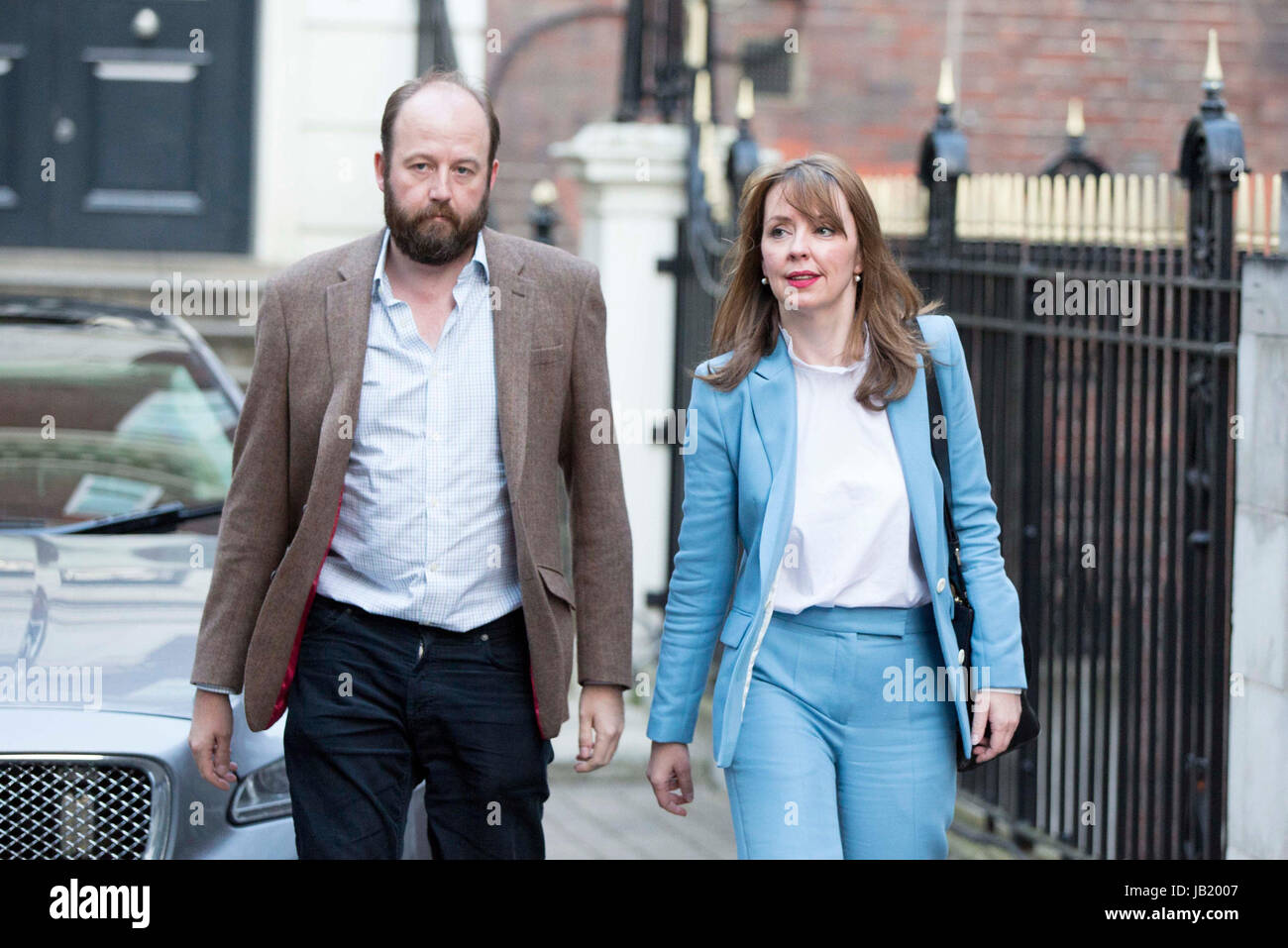 Prime Minister Theresa May's chief of staff Nick Timothy and Joint-chief of staff Fiona Hill leave Conservative Party HQ in Westminster, London, as Mrs May's future as Prime Minister and leader of the Conservatives was being openly questioned after her decision to hold a snap election disastrously backfired. Stock Photo