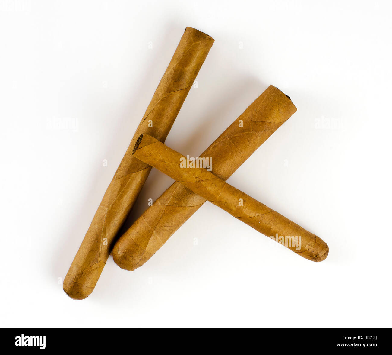 Drei große Zigarren; three large cigars on a white background Stock Photo