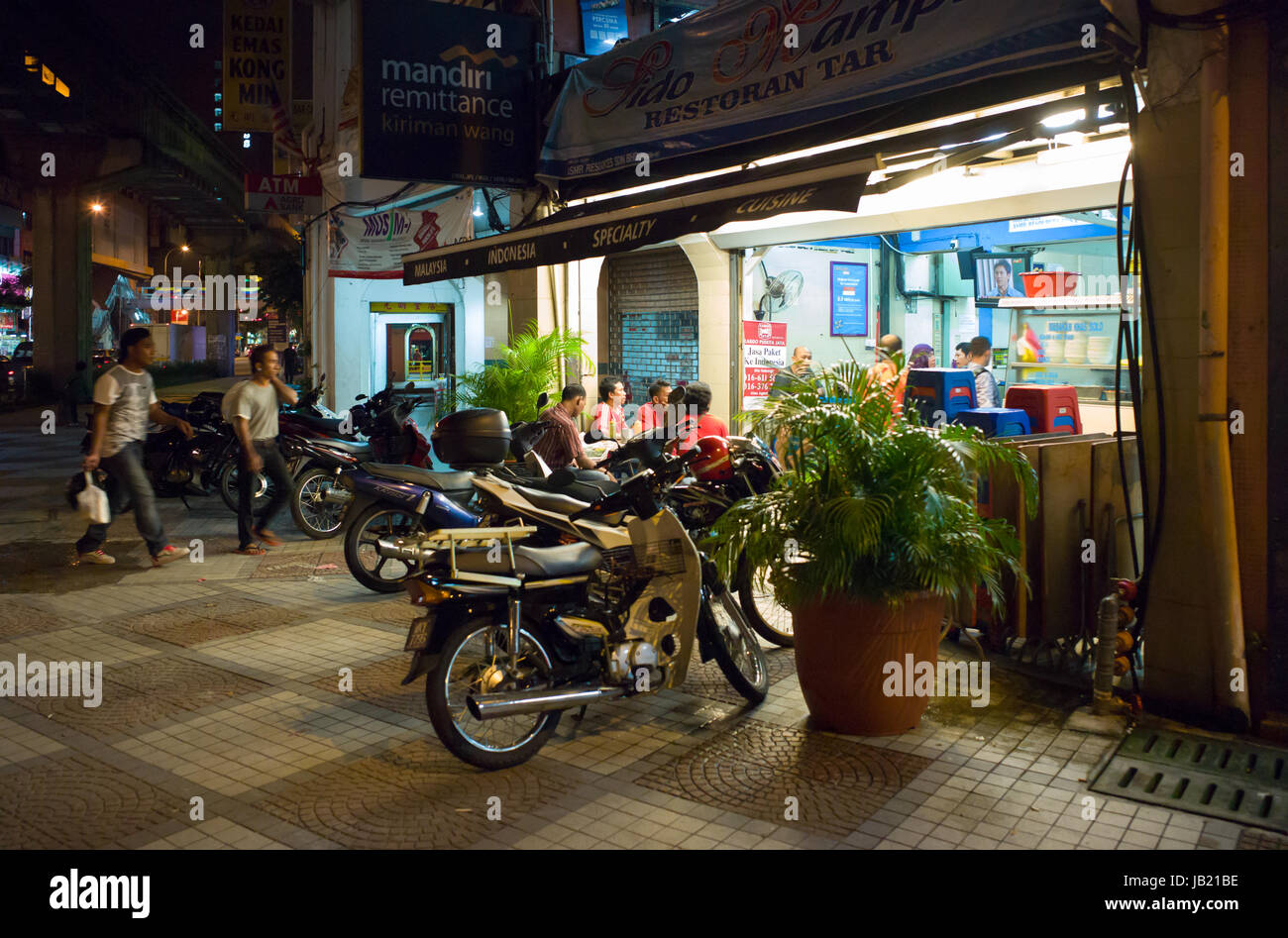 Roadside café in evening in Chow Kit, Kuala Lumpur, Malaysia Stock