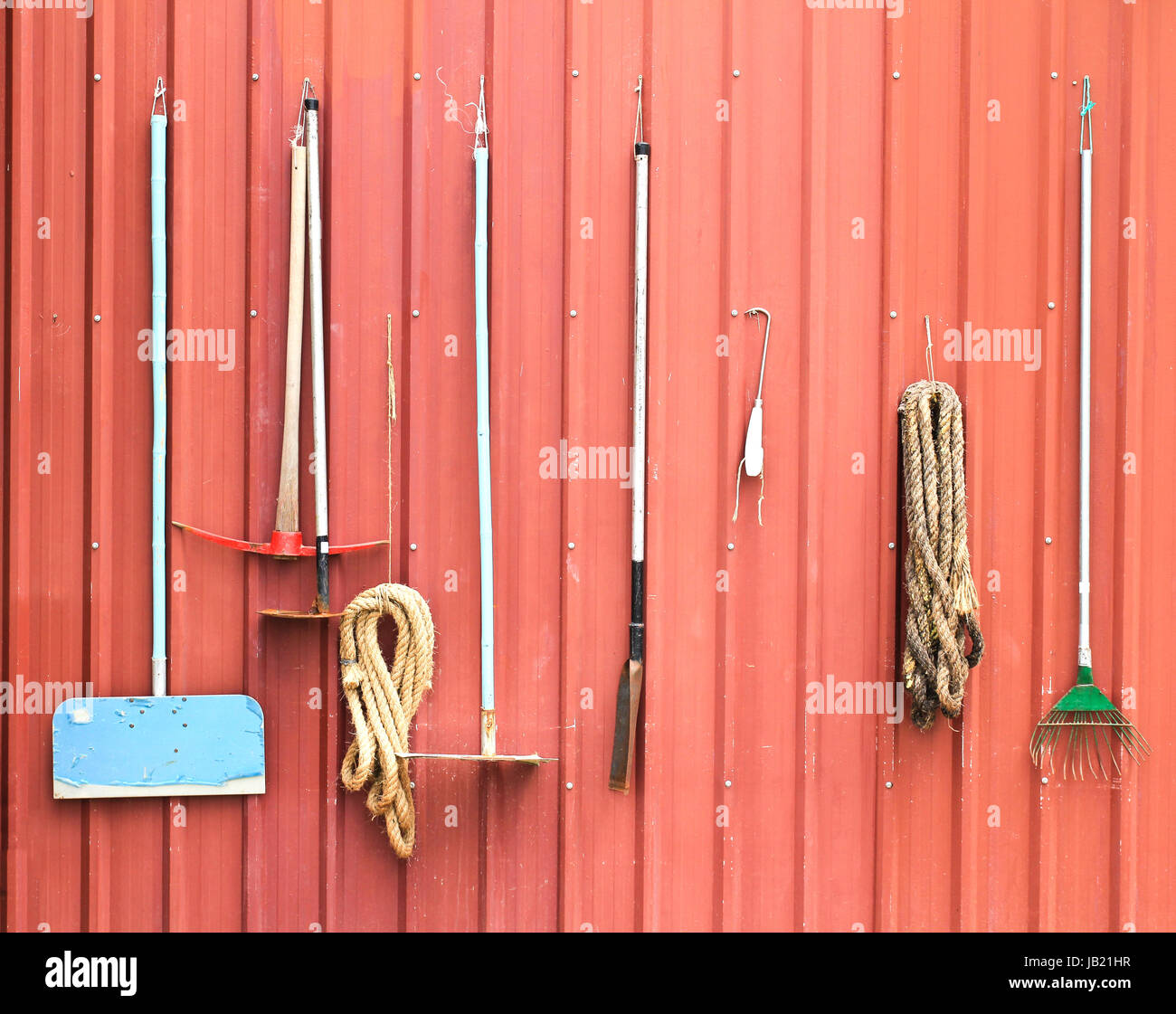 Farm Tools Hang On Red Barn Wall Stock Photo 144489347 Alamy