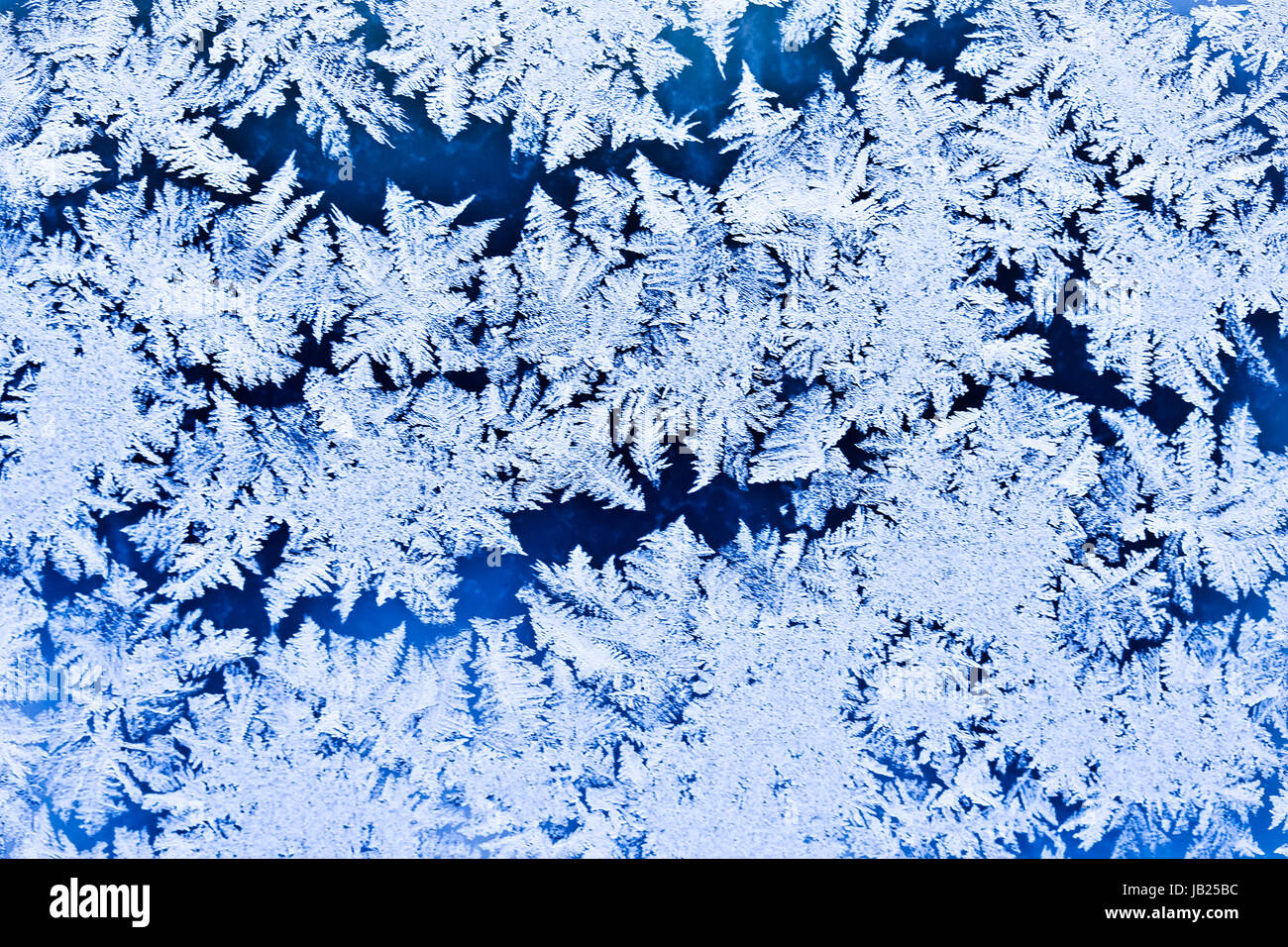 Frost pattern on a winter window Stock Photo - Alamy