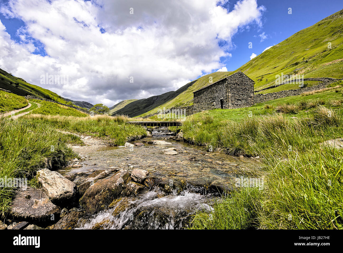 Old stone barn in Hagg Ghyll near Troutbeck in the Lake District national park Stock Photo