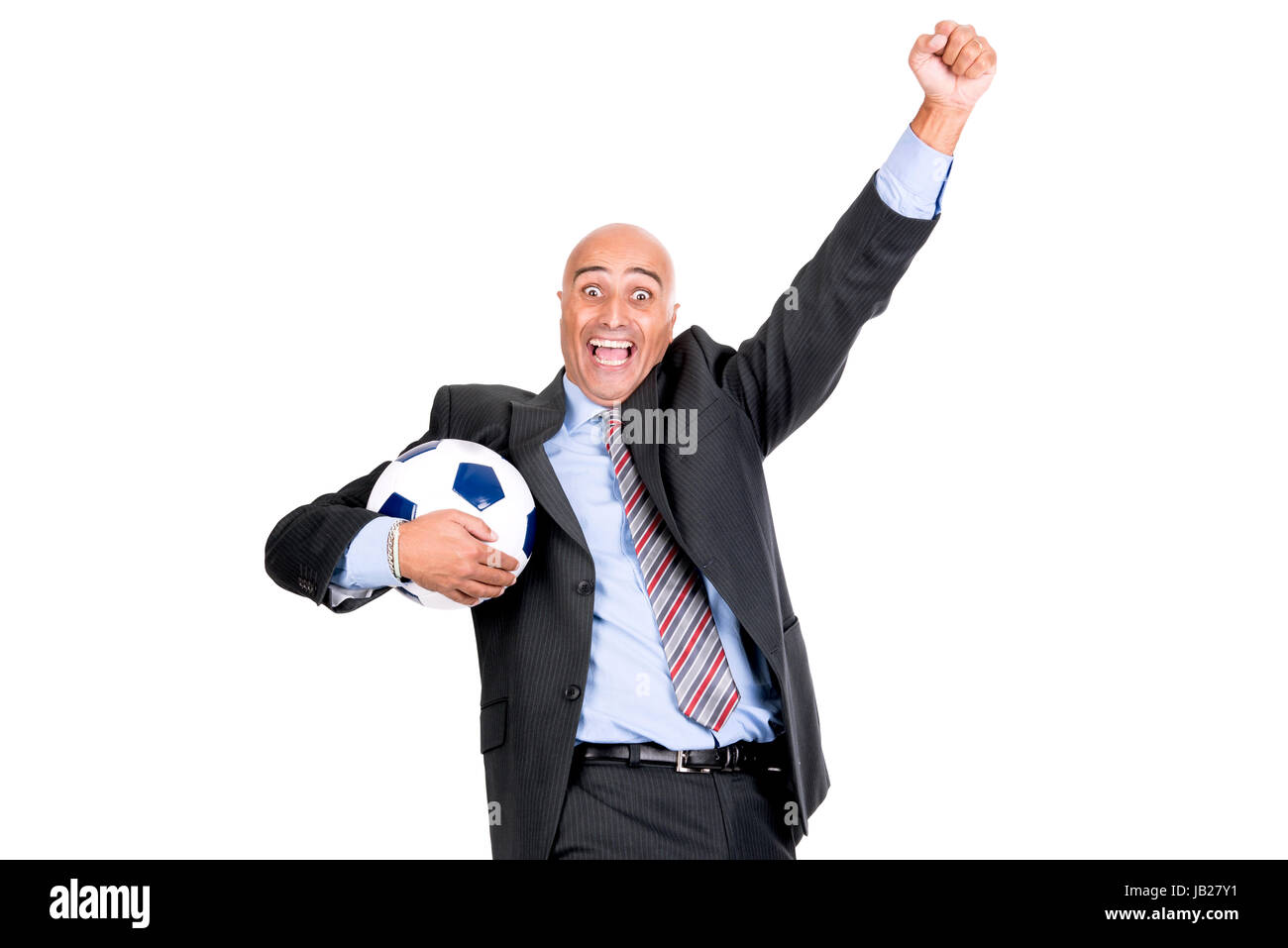 Happy businessman with soccer ball celebrating a goal Stock Photo - Alamy