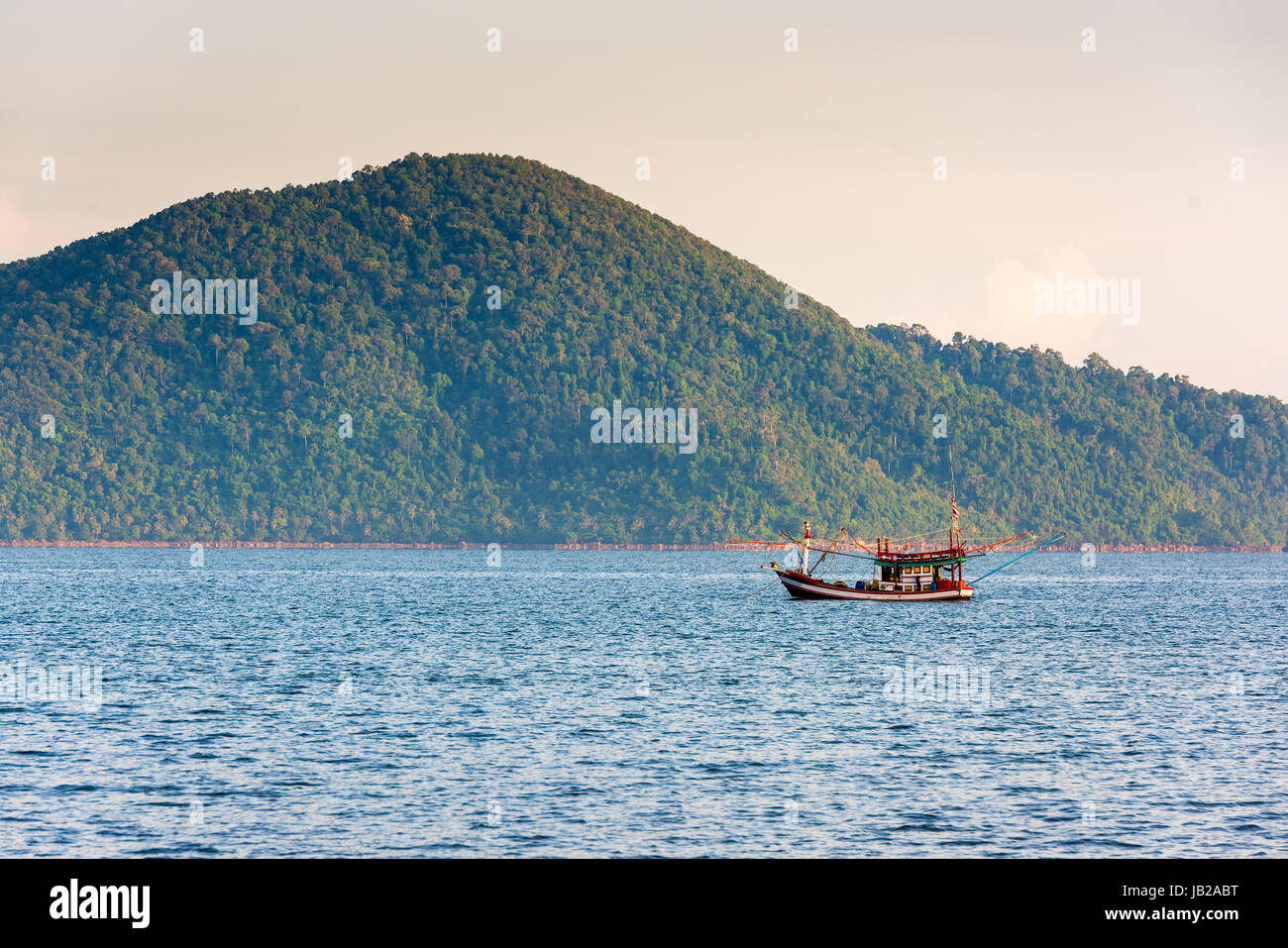 Fishing boat in the morning sea in thailand Stock Photo - Alamy