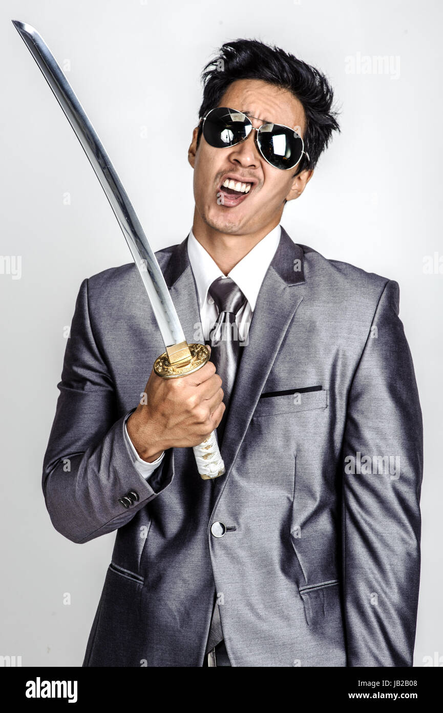 business man holding samurai sword yakuza Stock Photo - Alamy
