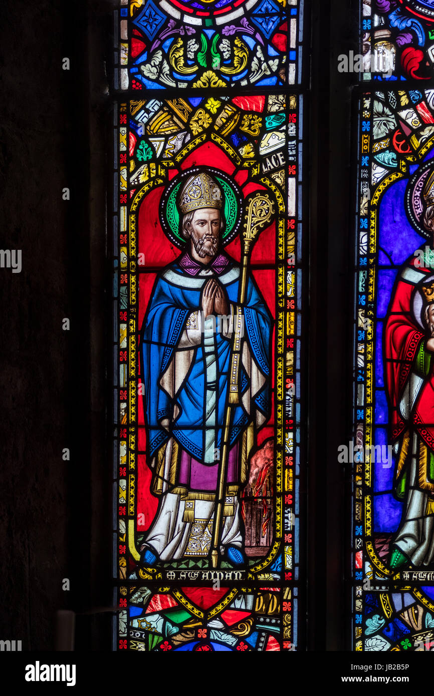 Stained glass windows of the chapel of St Cuthbert, Inner Farne Islands, Northumberland. UK Stock Photo
