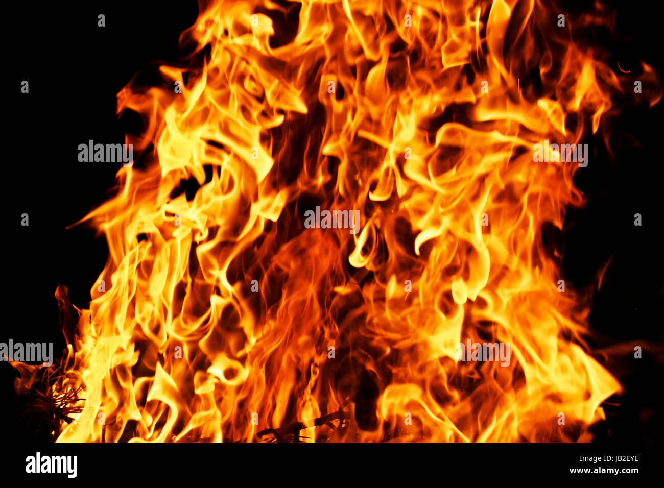 Beautiful yellow and orange hot fire on black background Stock Photo ...