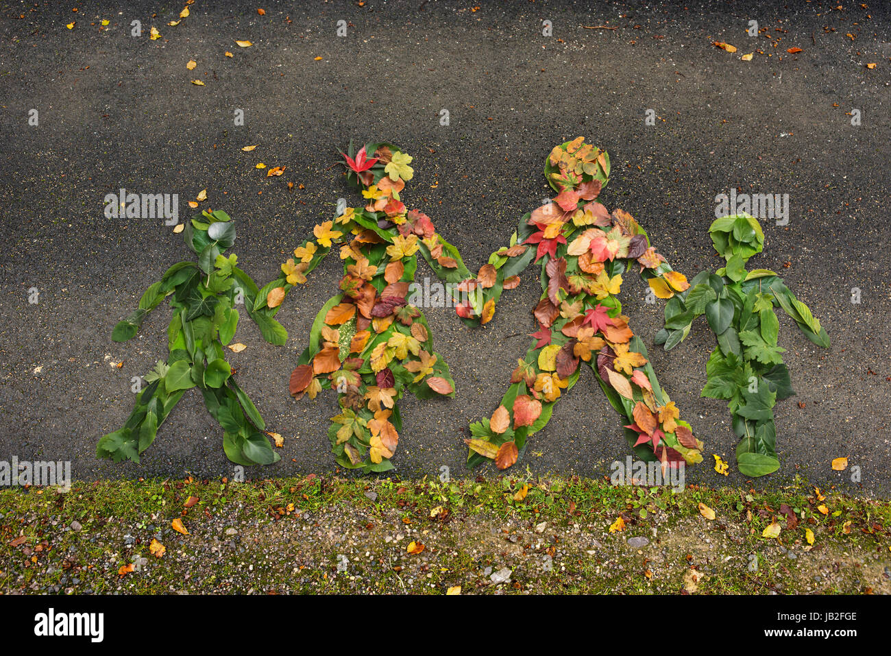 family symbol represented in Autumn leaves Stock Photo