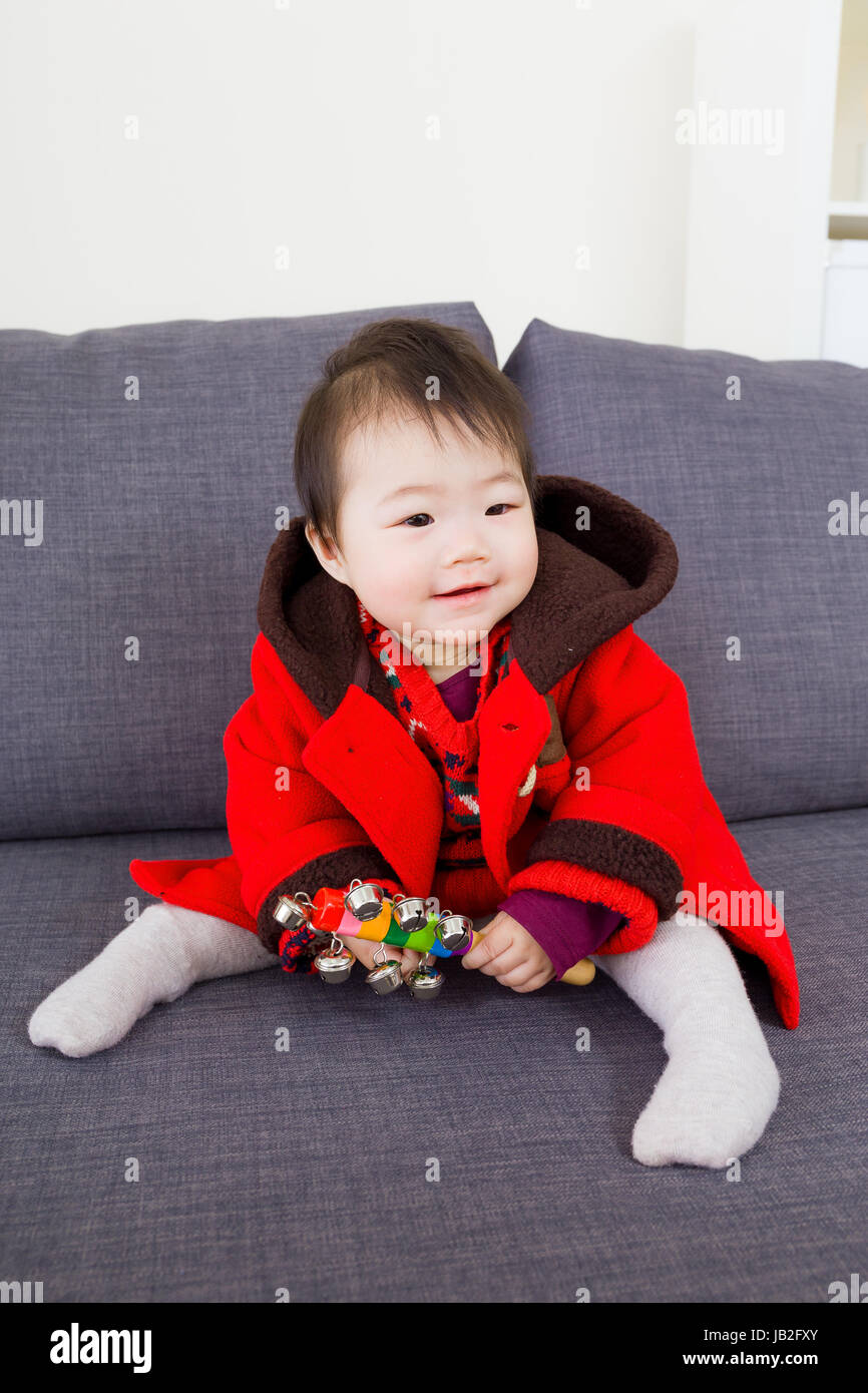 Little girl playing toy Stock Photo - Alamy