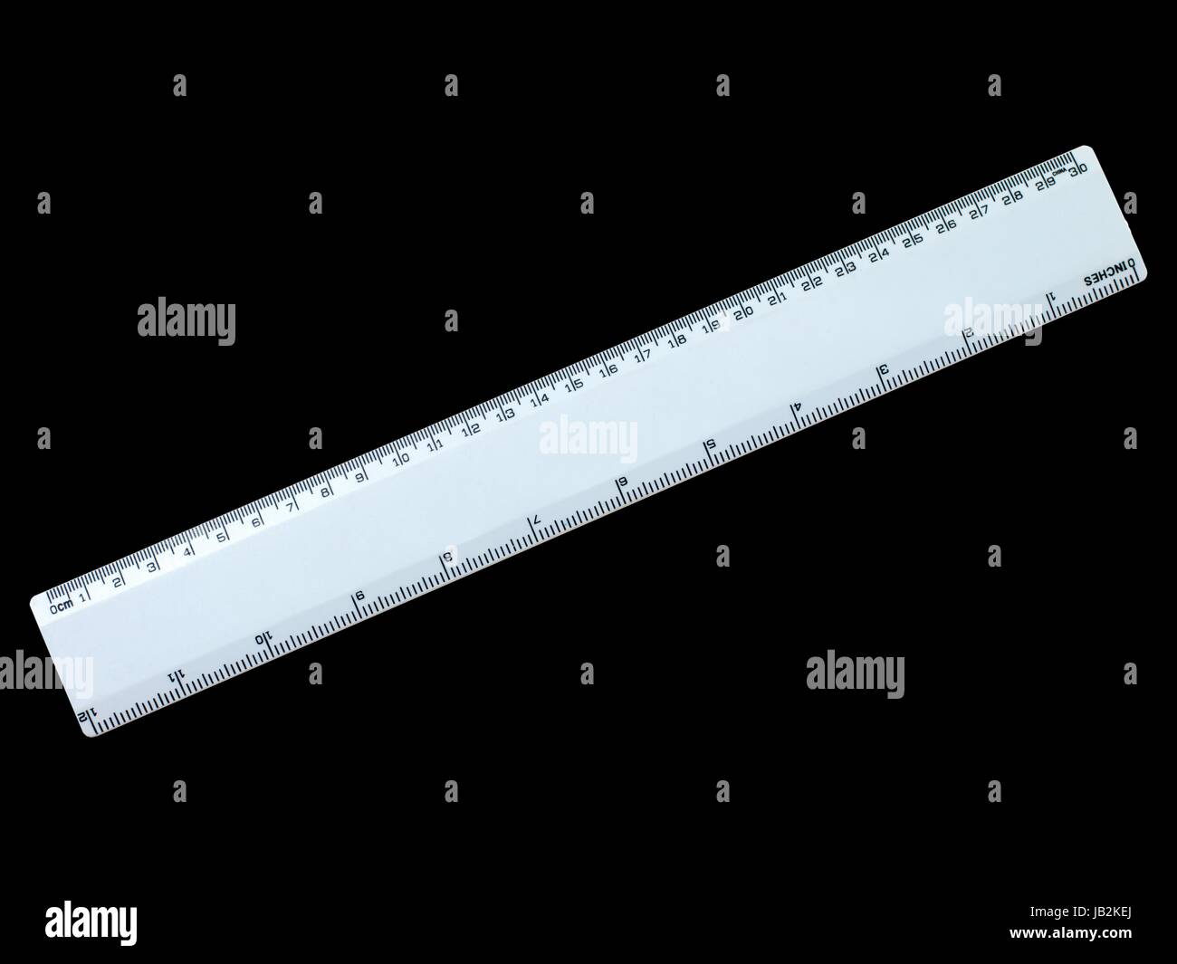 Rulers Isolated Against A Plain Black Background Stock Photo Alamy