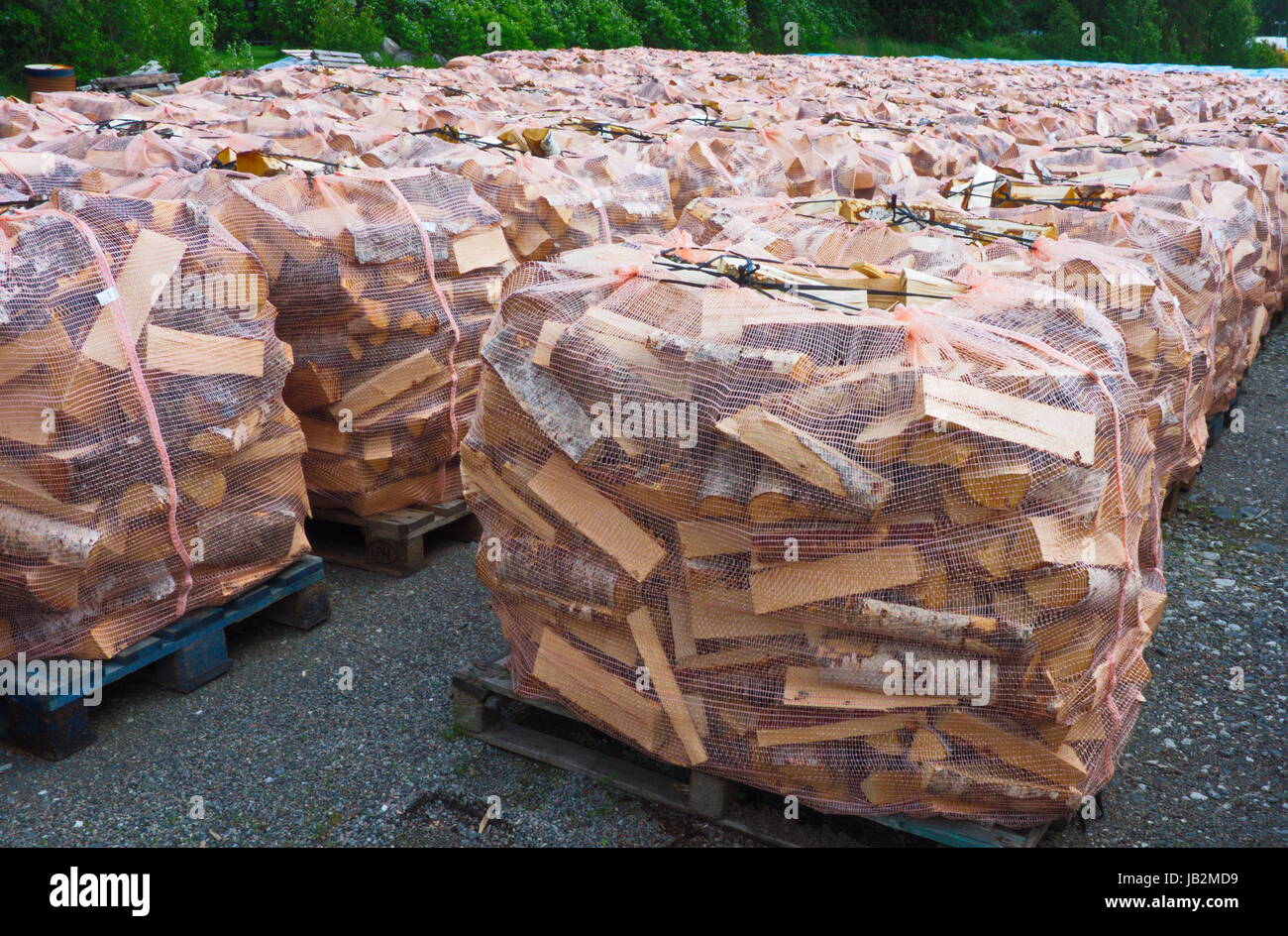Firewood stacked for sale Stock Photo Alamy