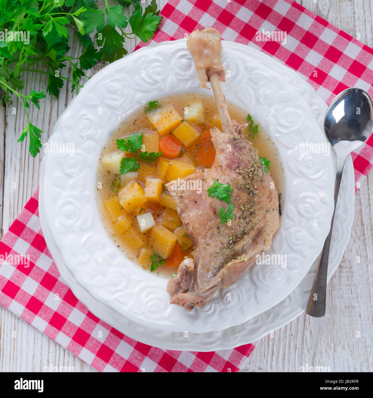 Goose - soup with red wine and thyme Stock Photo