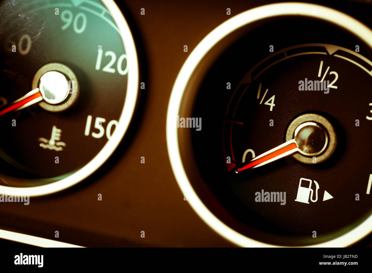 Coolant temperature and fuel level gauges on a car's dashboard Stock Photo Alamy
