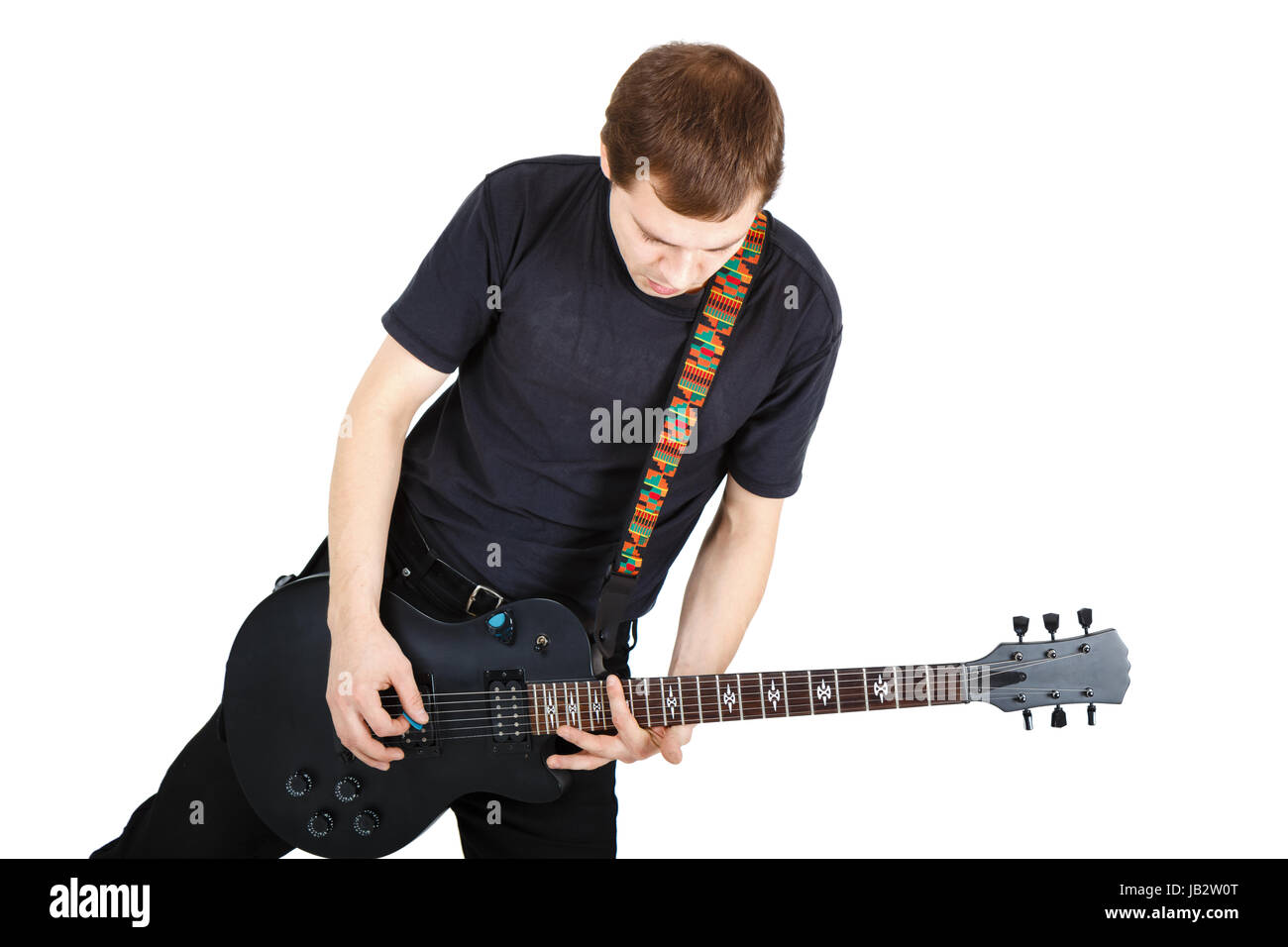 Man in black clothes with an electric guitar Stock Photo