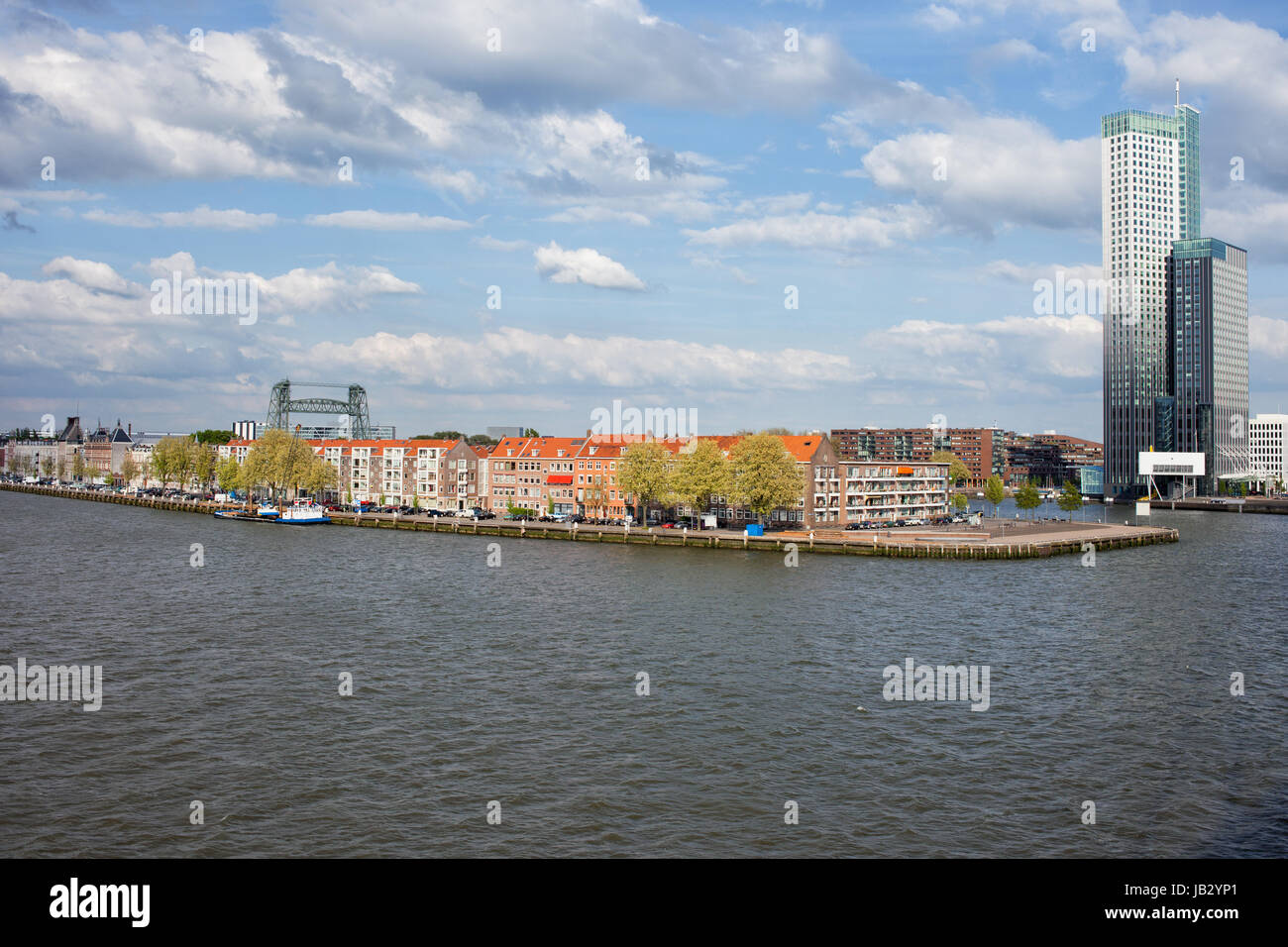 City of Rotterdam cityscape with apartment houses on a river island in South Holland, the Netherlands. Stock Photo