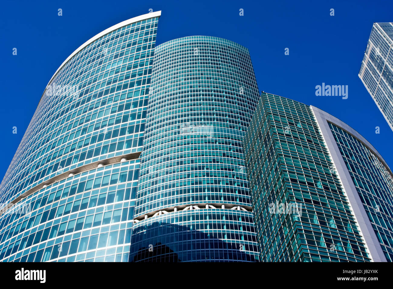 Modern skyscrapers under blue sky Stock Photo - Alamy