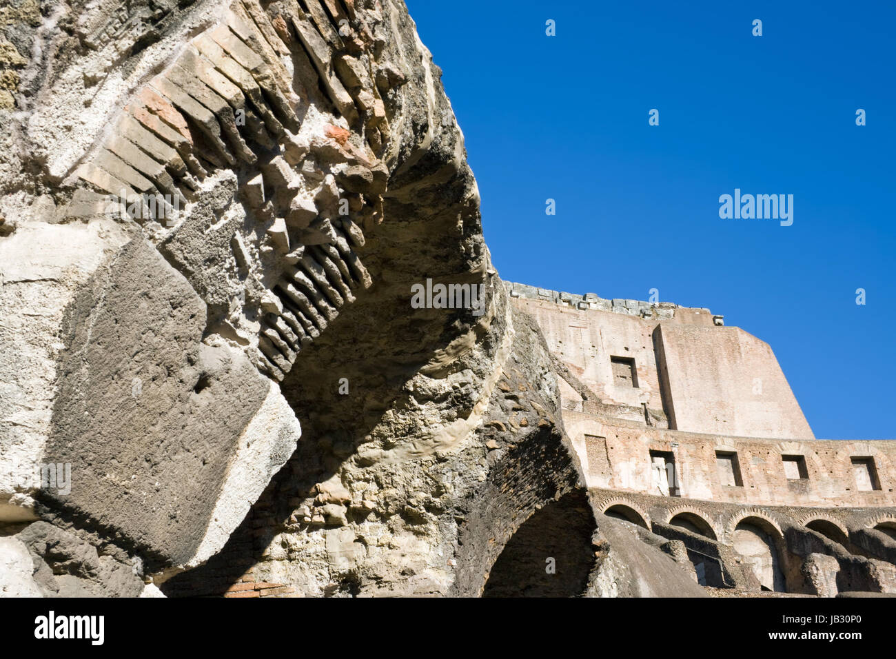 Ancient roman amphitheater Colosseum in Rome, Italy Stock Photo