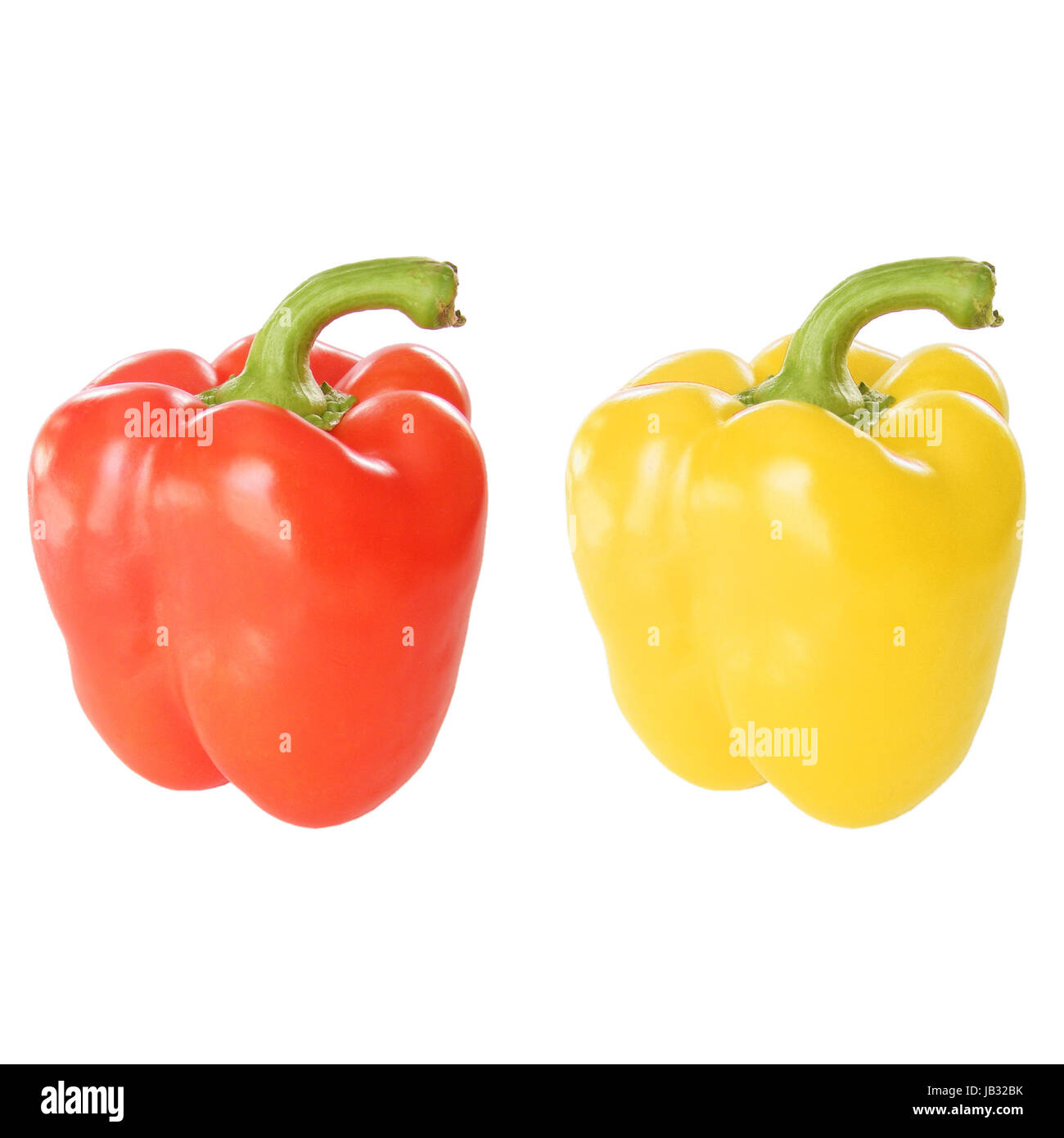 Red and yellow peppers isolated over white background Stock Photo - Alamy