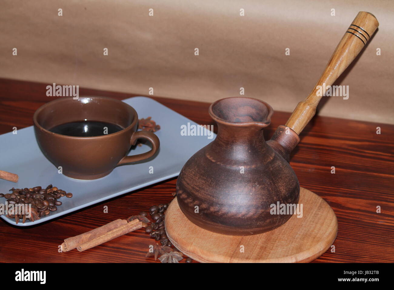 https://c8.alamy.com/comp/JB32TB/still-life-with-a-cup-of-coffee-grains-and-turka-JB32TB.jpg