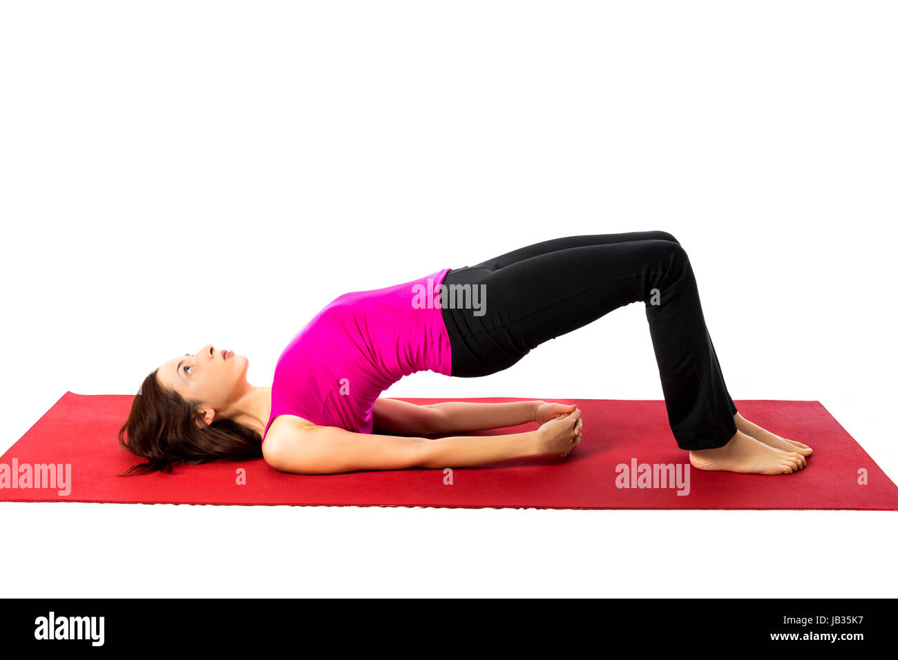Young woman doing Bridge Pose in Yoga and Pilates (Series with the same