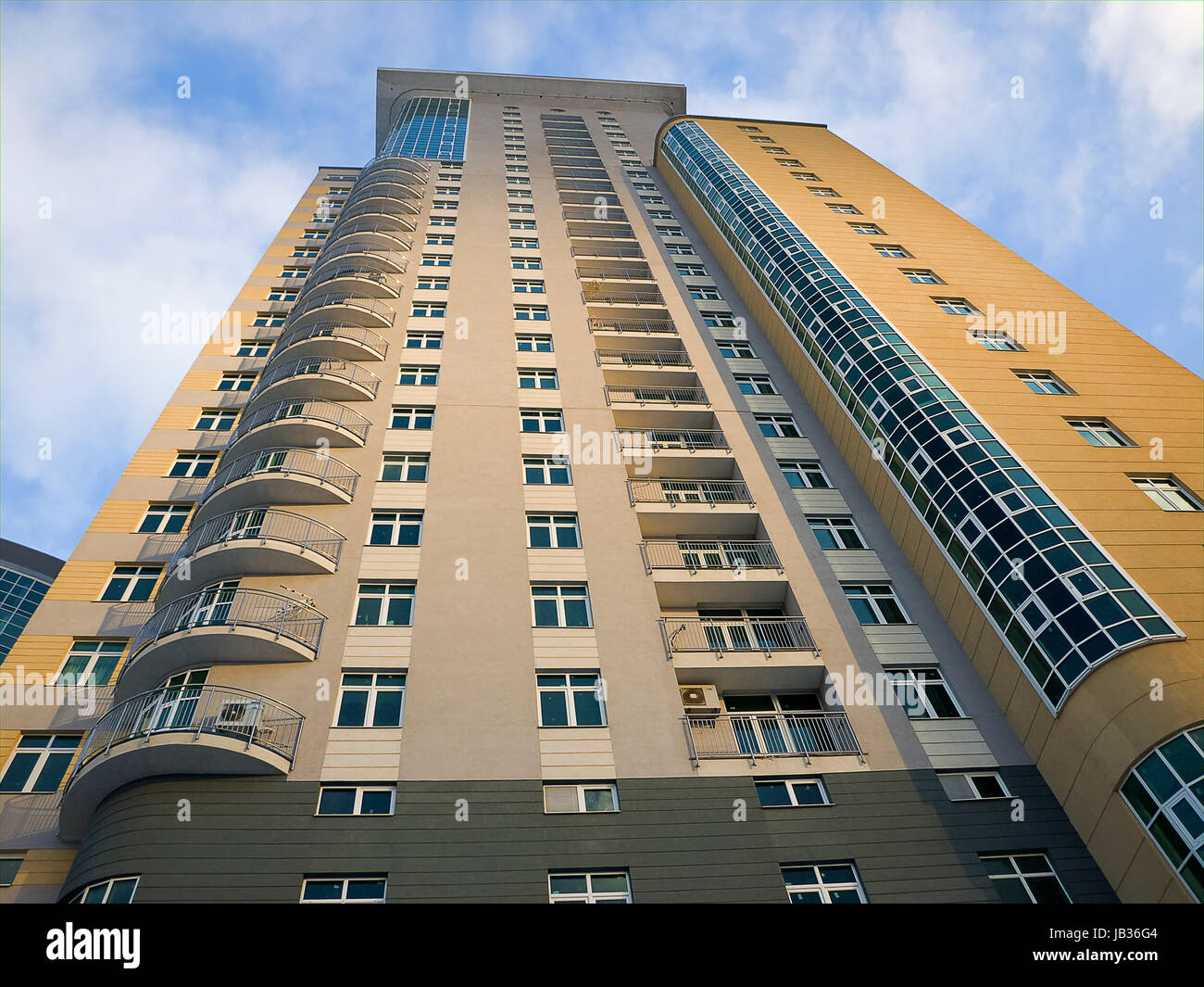 high residential building on a blue background Stock Photo - Alamy