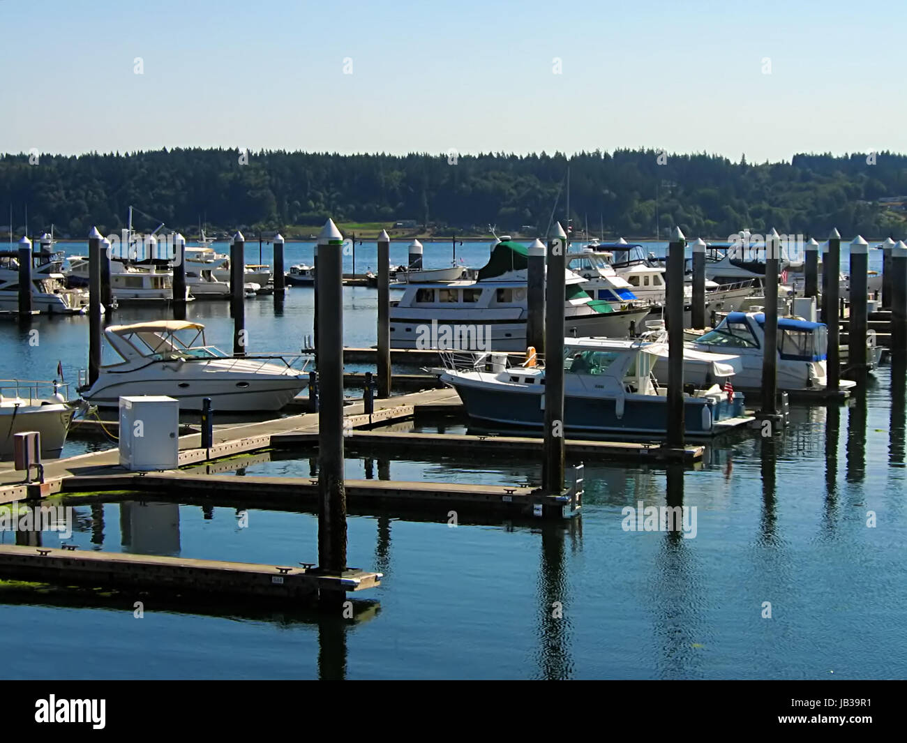A photograph of a boats anchored at a dock Stock Photo - Alamy