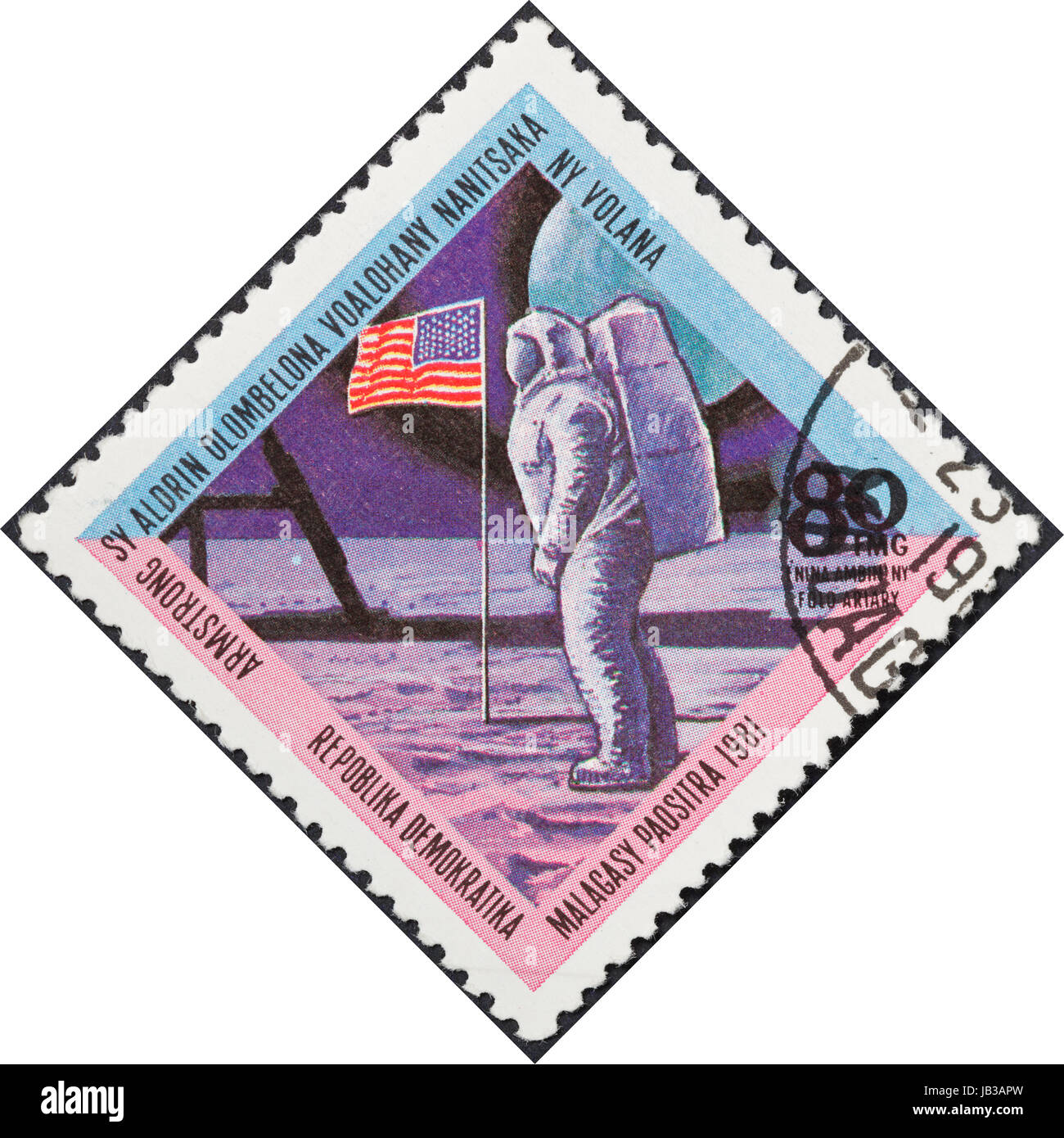 MALAGACY REPUBLIC - CIRCA 1981: A postage stamp printed in the Madagascar shows Neil Alden Armstrong first person to walk on the Moon, circa 1981 Stock Photo