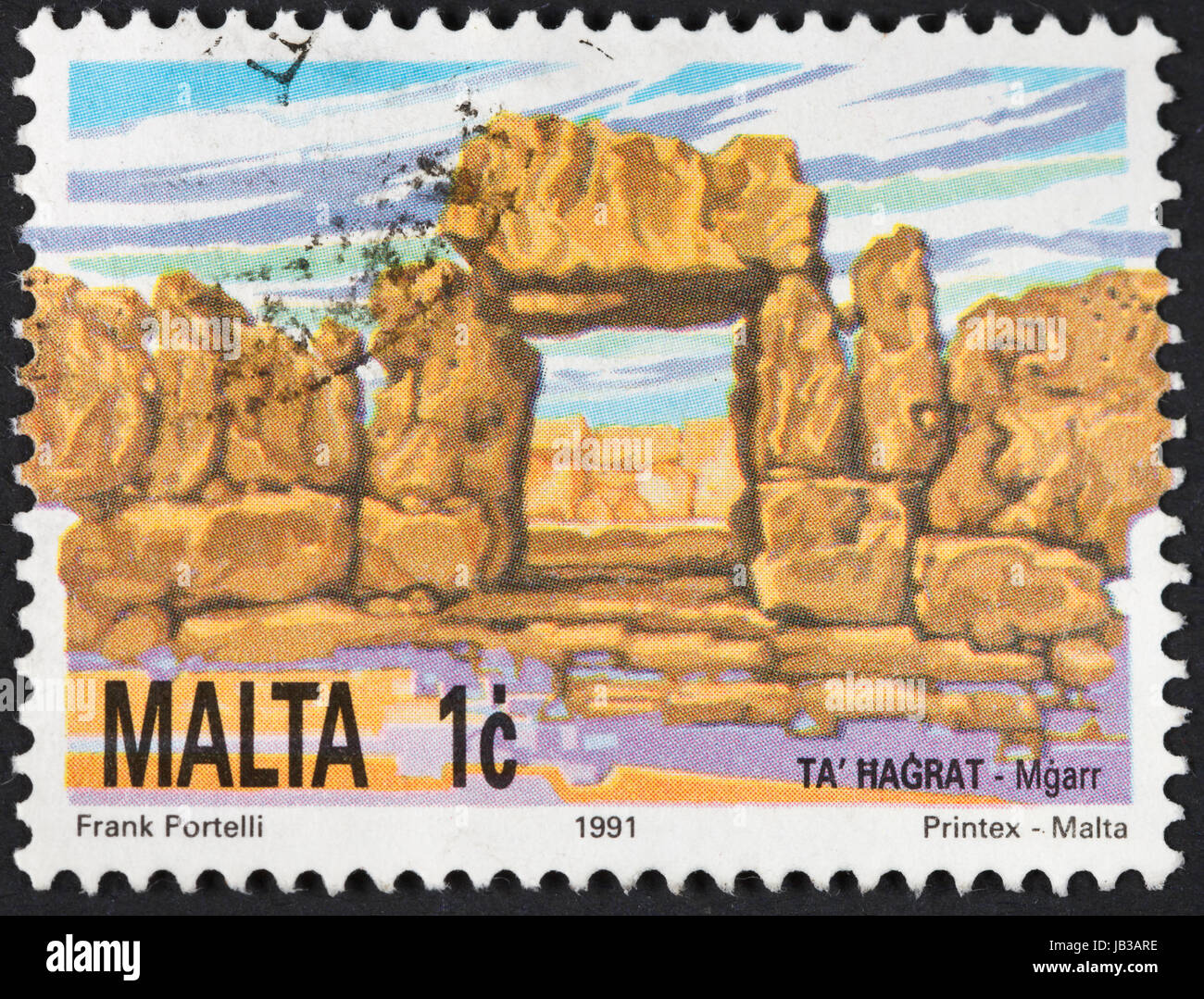 MALTA - CIRCA 1991: A postage stamp printed in the Malta shows Megalithic Ta Hagrat Temple in Mgarr, circa 1991 Stock Photo