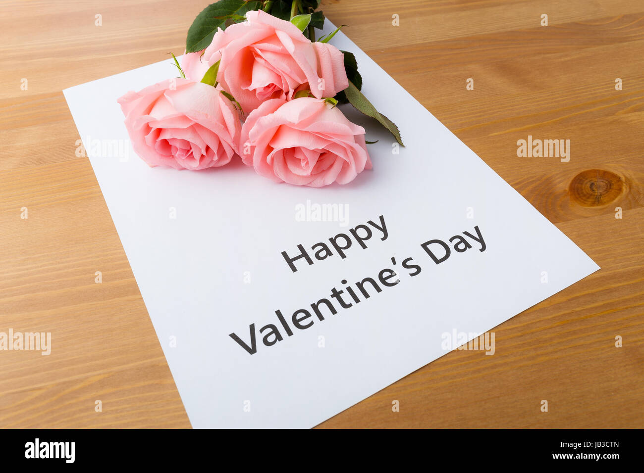 Rose and gift card message Stock Photo Alamy