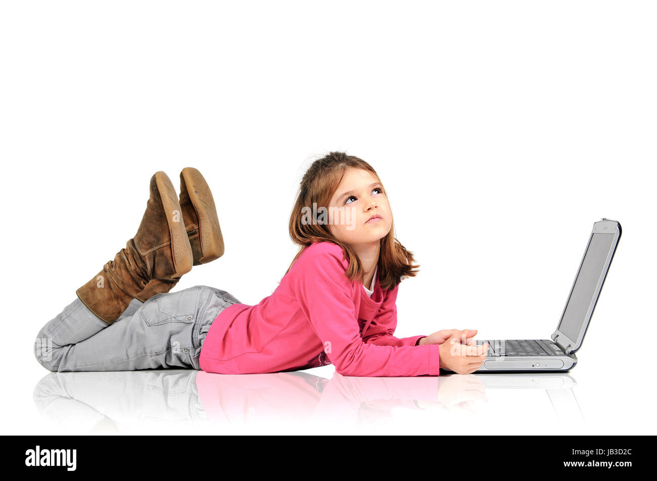 Young girl posing with laptop isolated in white Stock Photo - Alamy
