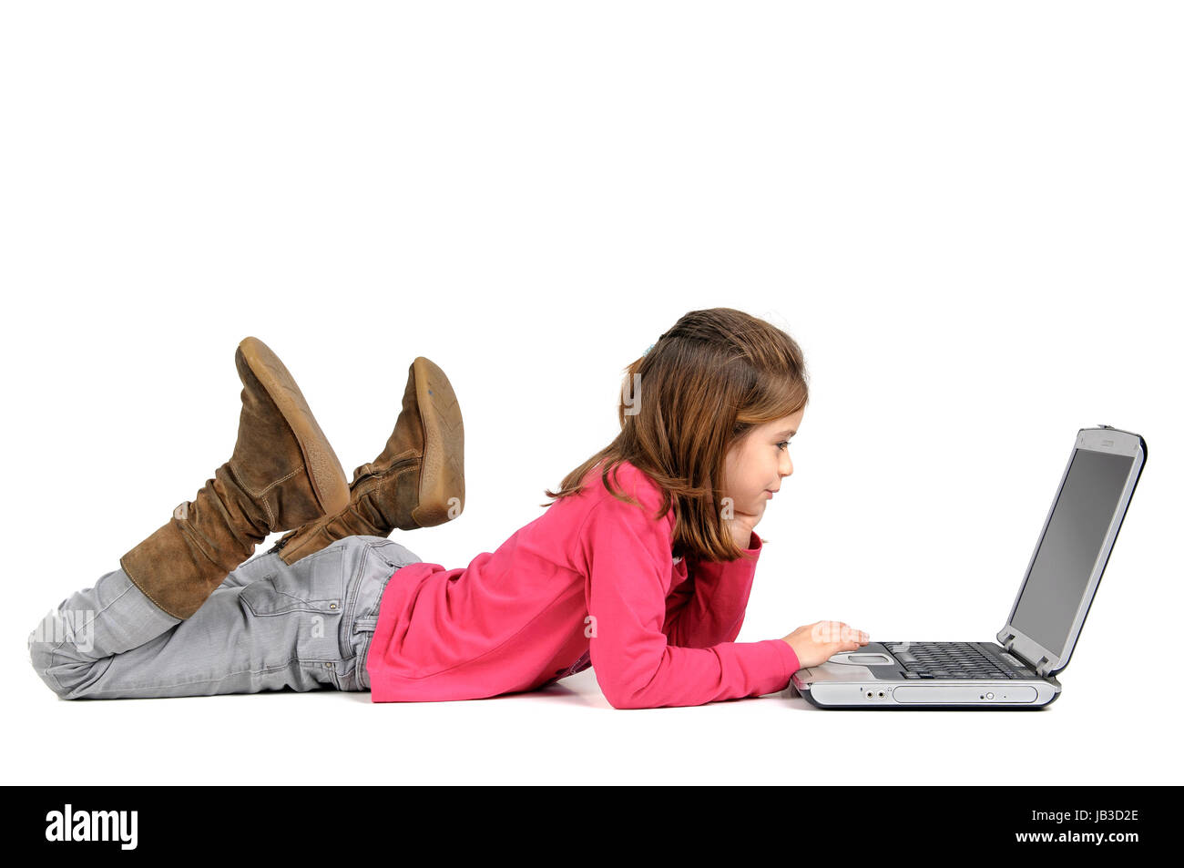 Young girl posing with laptop isolated in white Stock Photo - Alamy