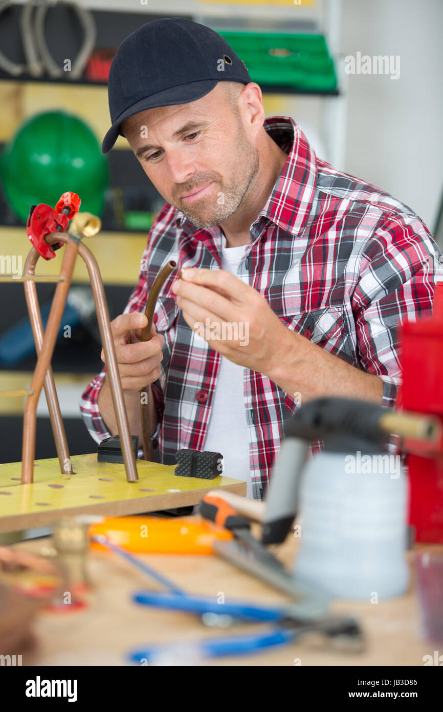 plumber using welding gas torch to solder copper pipes Stock Photo Alamy