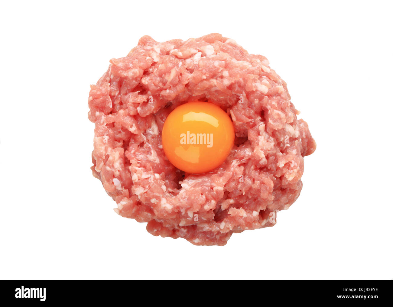 Raw ground meat and egg yolk Stock Photo Alamy