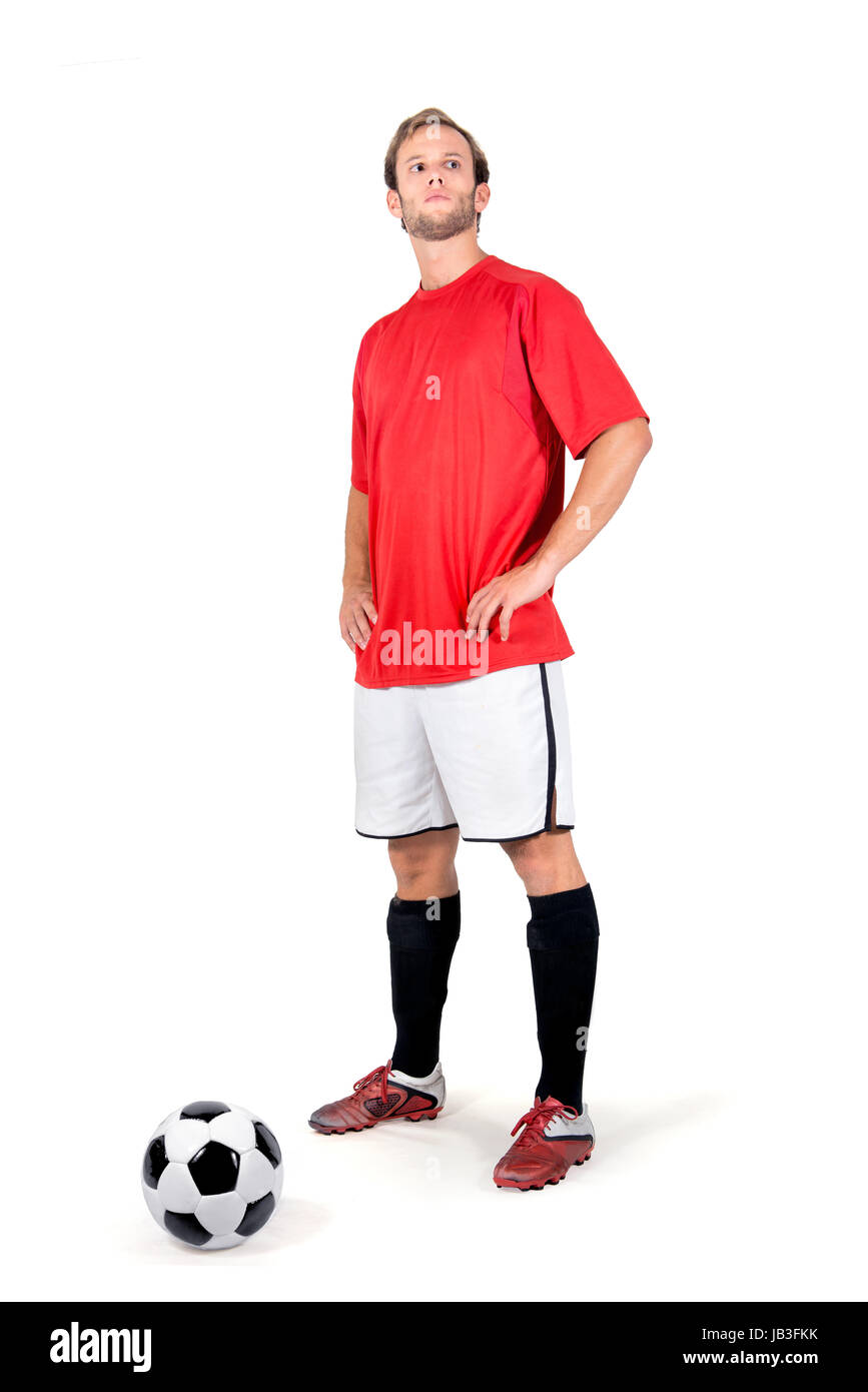 Football player waiting for a free kick isolated in white Stock Photo