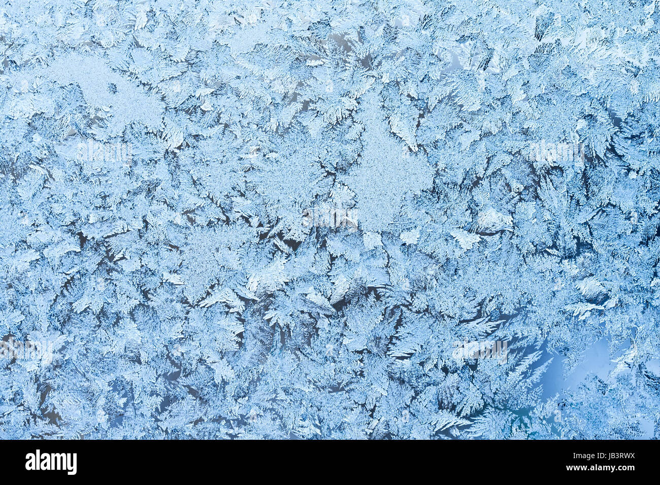 Beautiful pattern of frost on winter window Stock Photo - Alamy