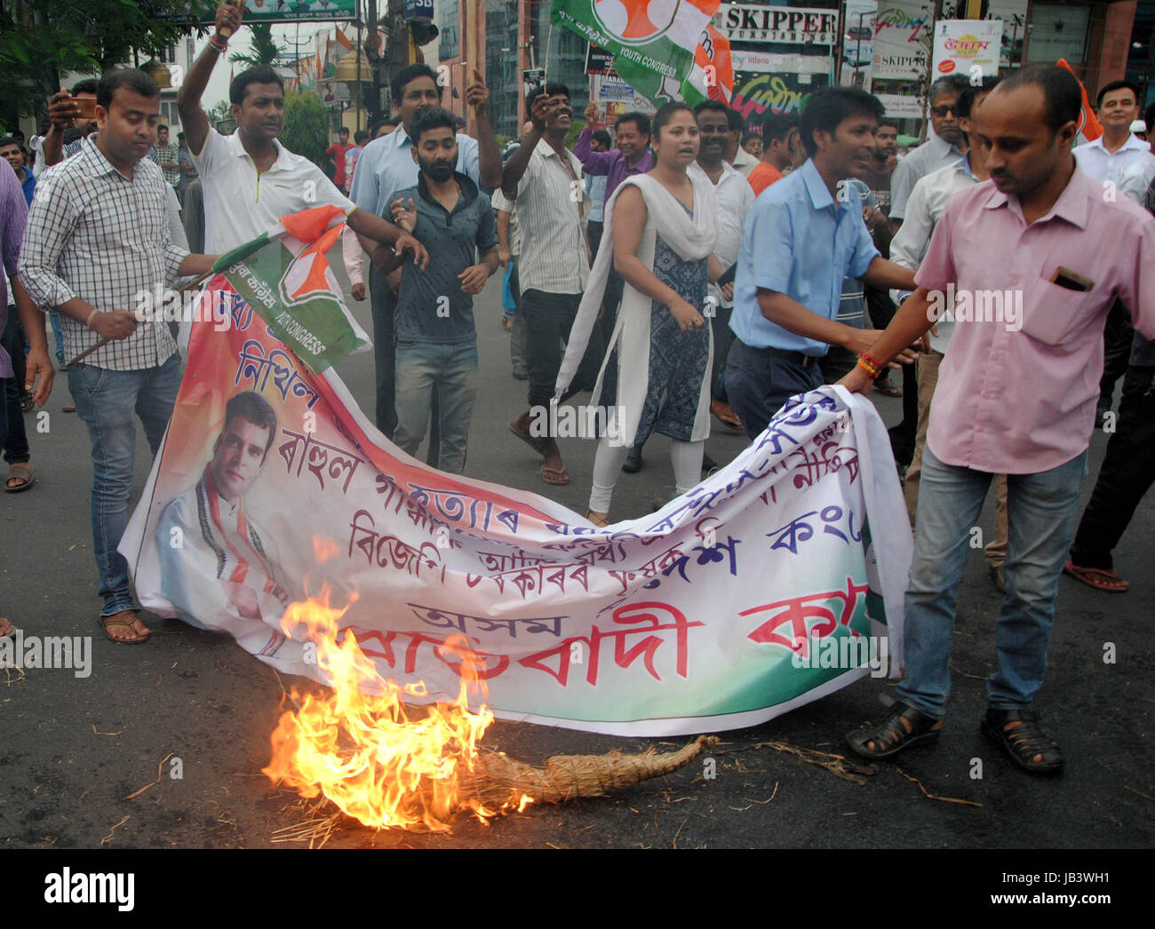 Activists of Indian Youth Congress (IYC) being whisked away by police while  staging a demonstration against detention of Congress Vice-President Rahul  Gandhi in Madhya Pradesh, in front of Rajiv Bhawan in Guwahati. (