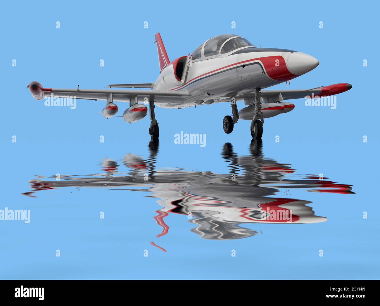 Aero L-39 Albatros and reflective water surface in blue back Stock Photo