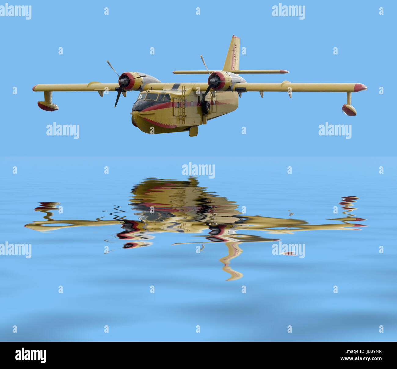 historic flying boat over mirroring water surface in blue ambiance Stock Photo