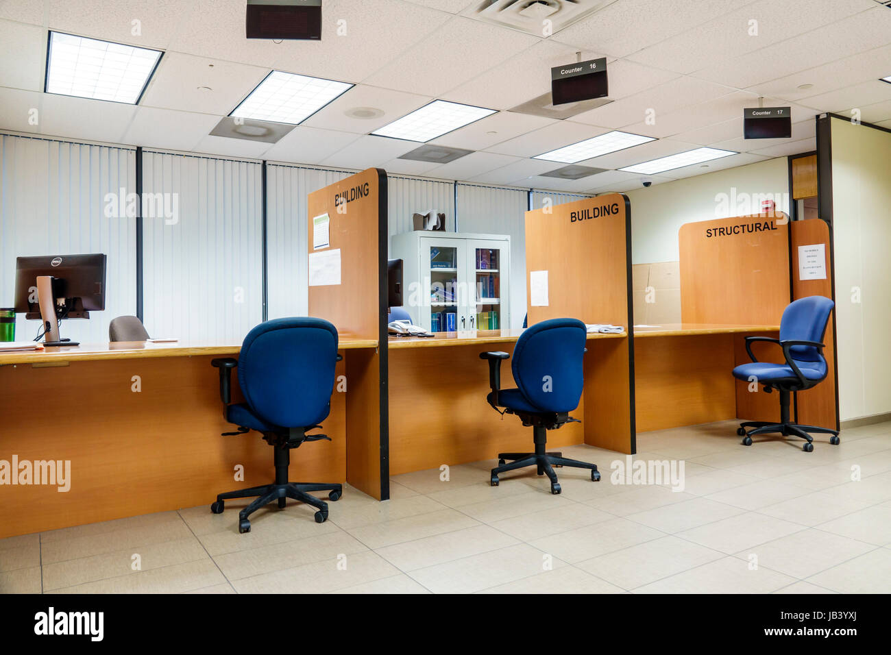 Miami Beach Florida,City of,Miami Beach,City Hall,building Department,contractor permits,building,structural,empty office pods,chairs,FL170401060 Stock Photo