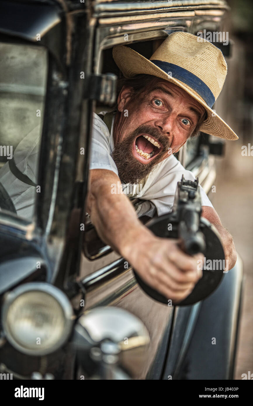 Gangster with machine gun hires stock photography and images Alamy