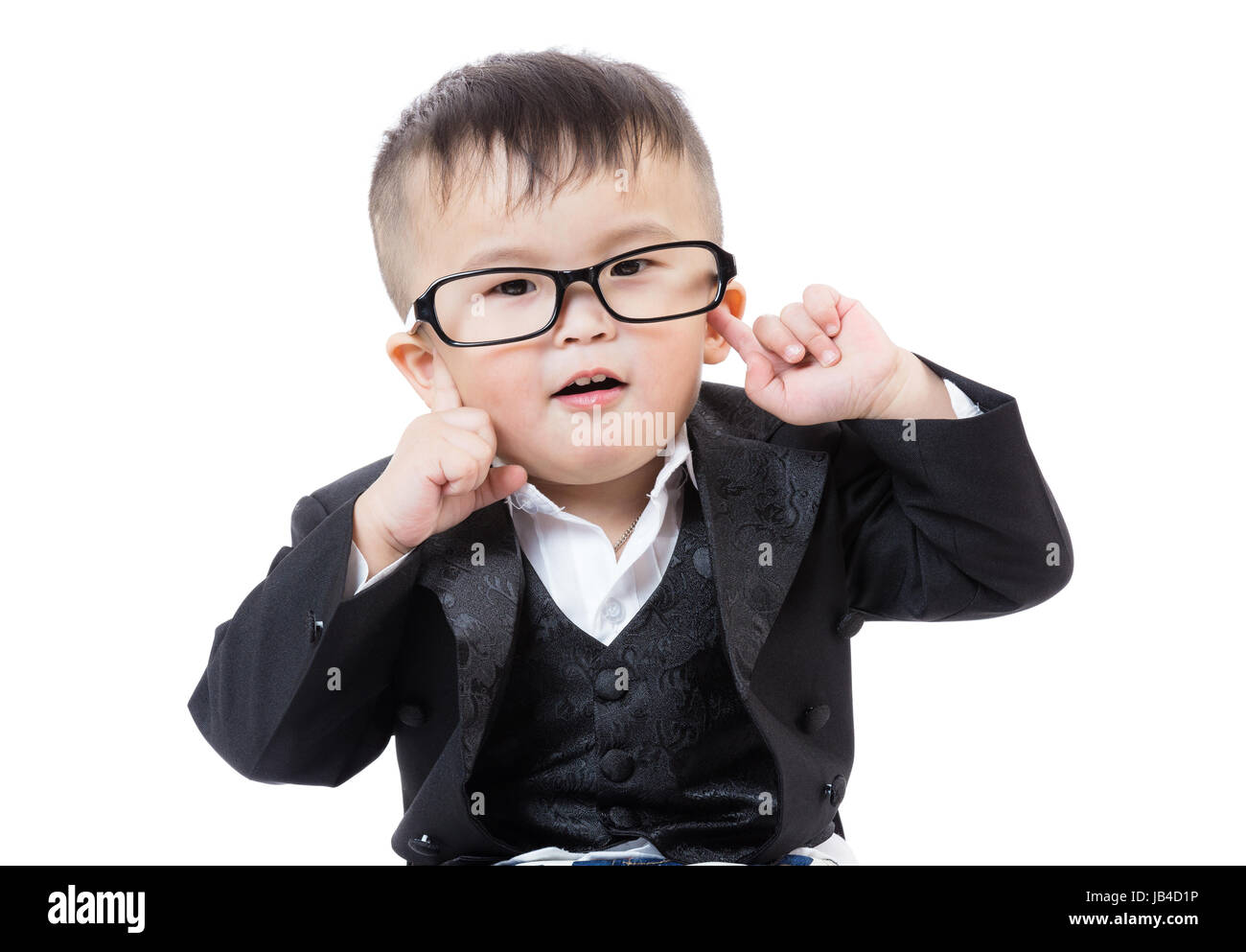 Baby boy finger pointing to his ear Stock Photo - Alamy