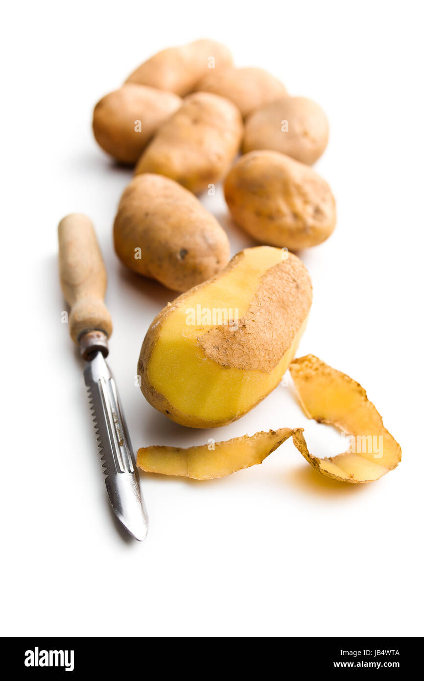 Demonstrates a left handed potato peeler in london hi-res stock