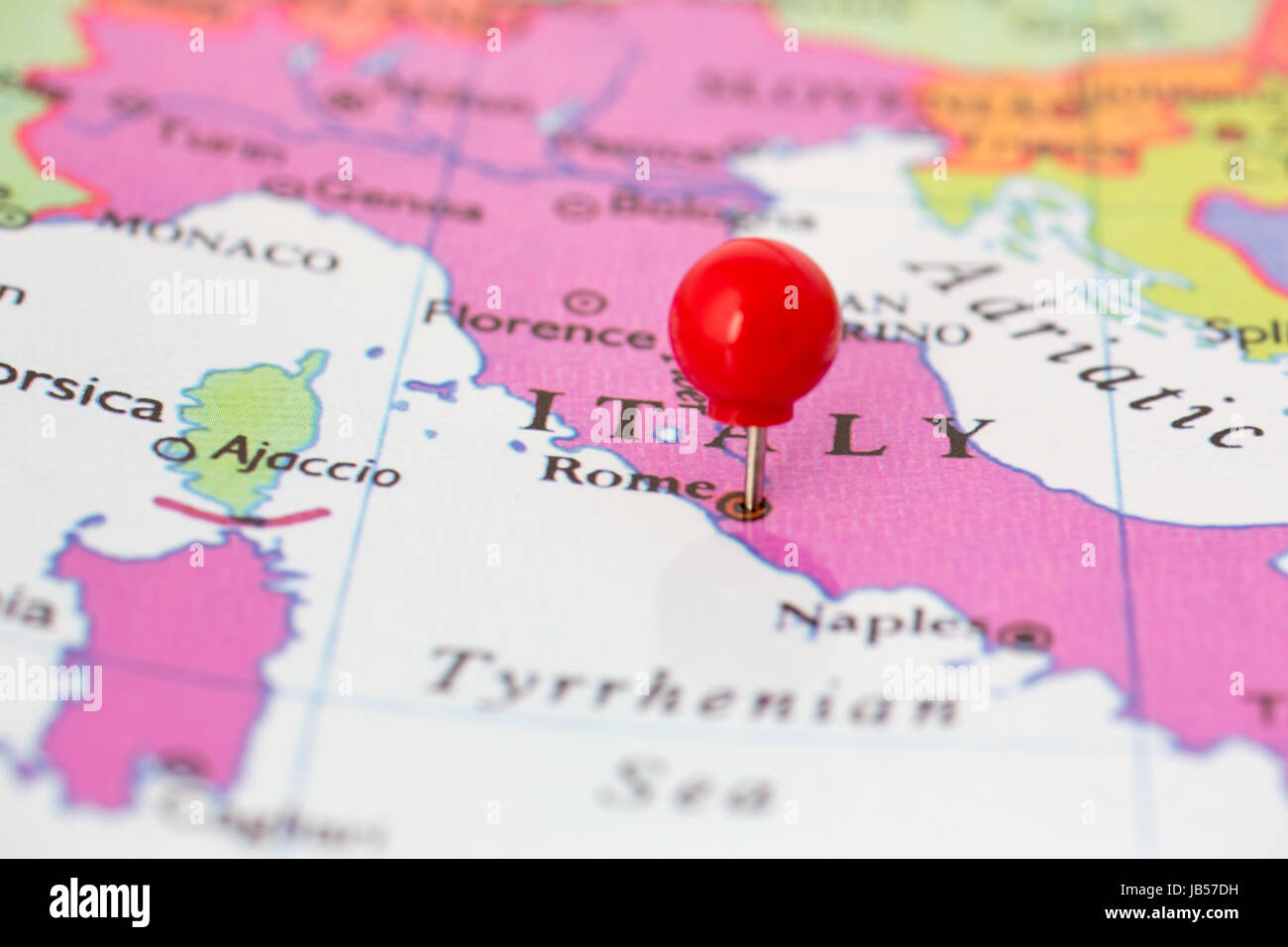 Round Red Thumb Tack Pinched Through City Of Rome On Italy Map Part Stock Photo Alamy