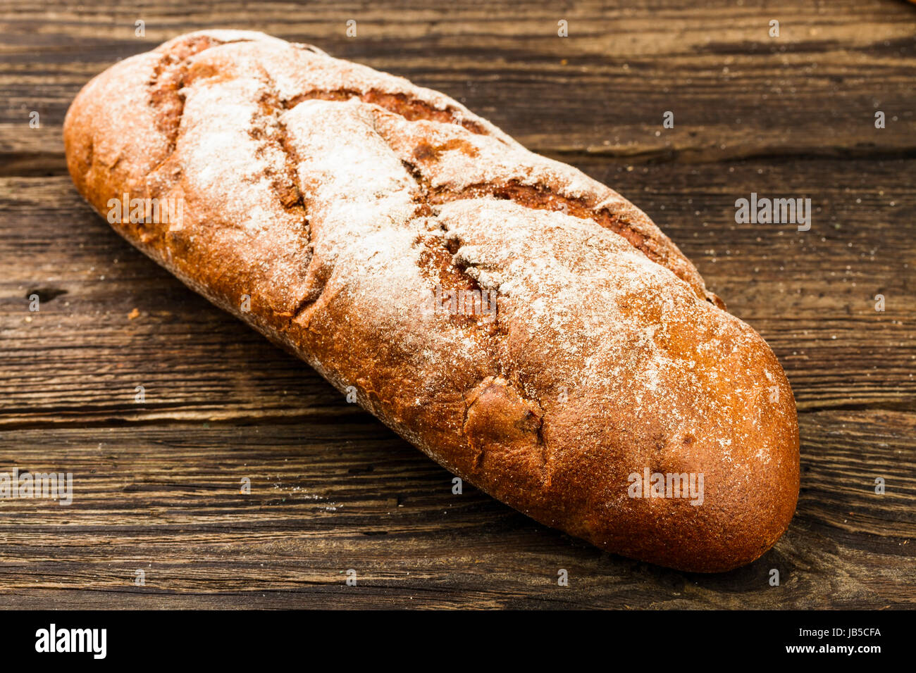 fresh white bread on dark background Stock Photo - Alamy